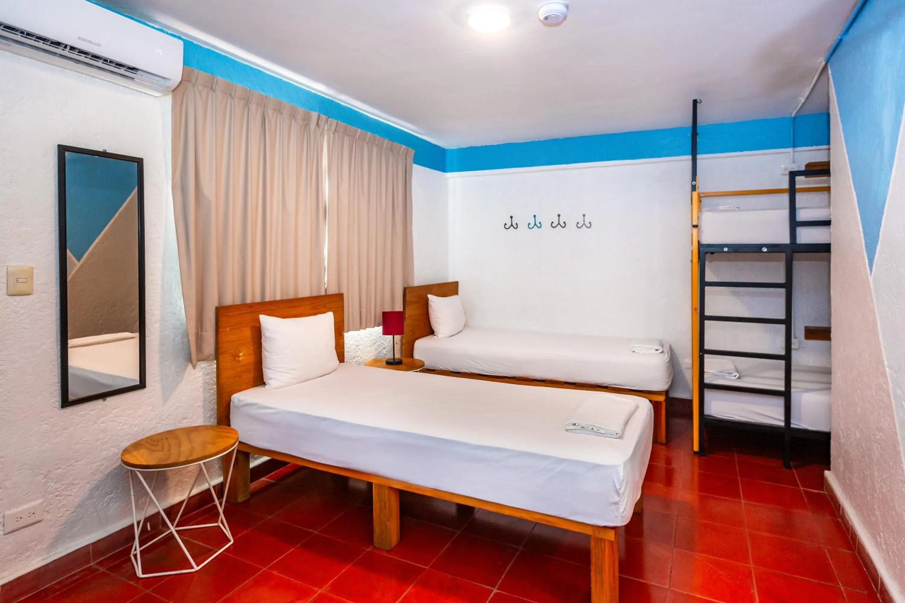 Photo of the whole room in Nílu Cancun Downtown by Selina