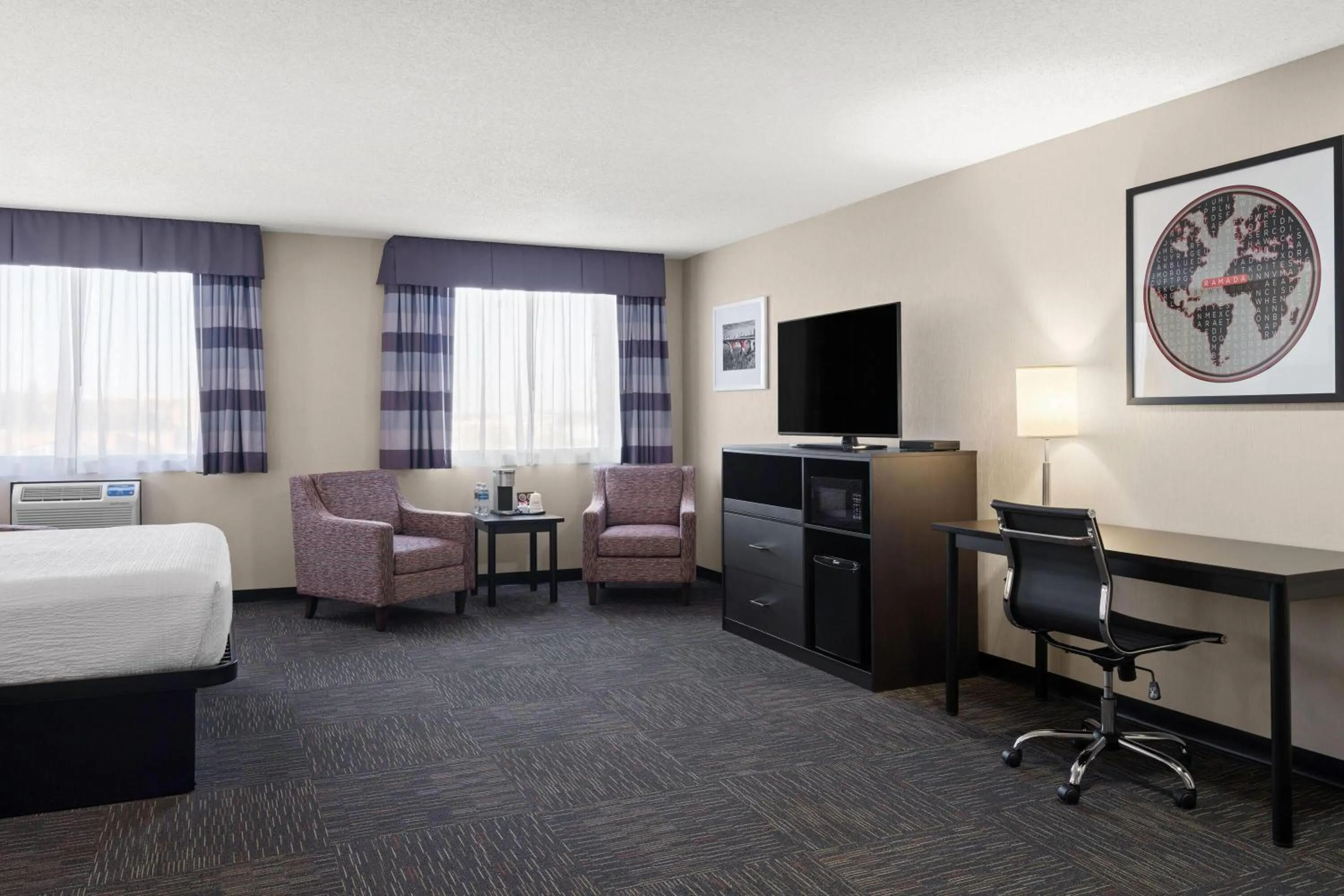 Photo of the whole room, Bed in Ramada by Wyndham Saskatoon