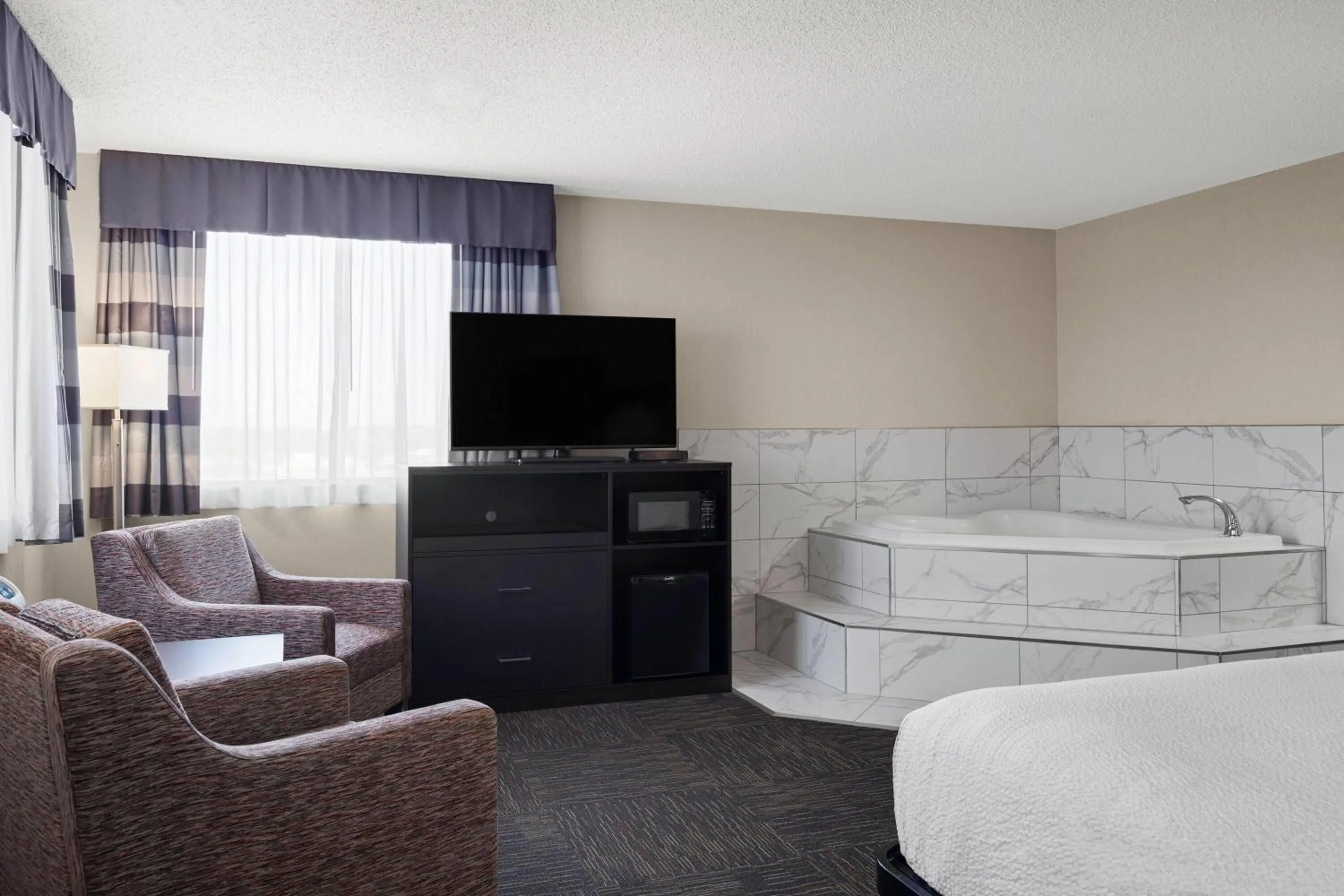 Photo of the whole room in Ramada by Wyndham Saskatoon