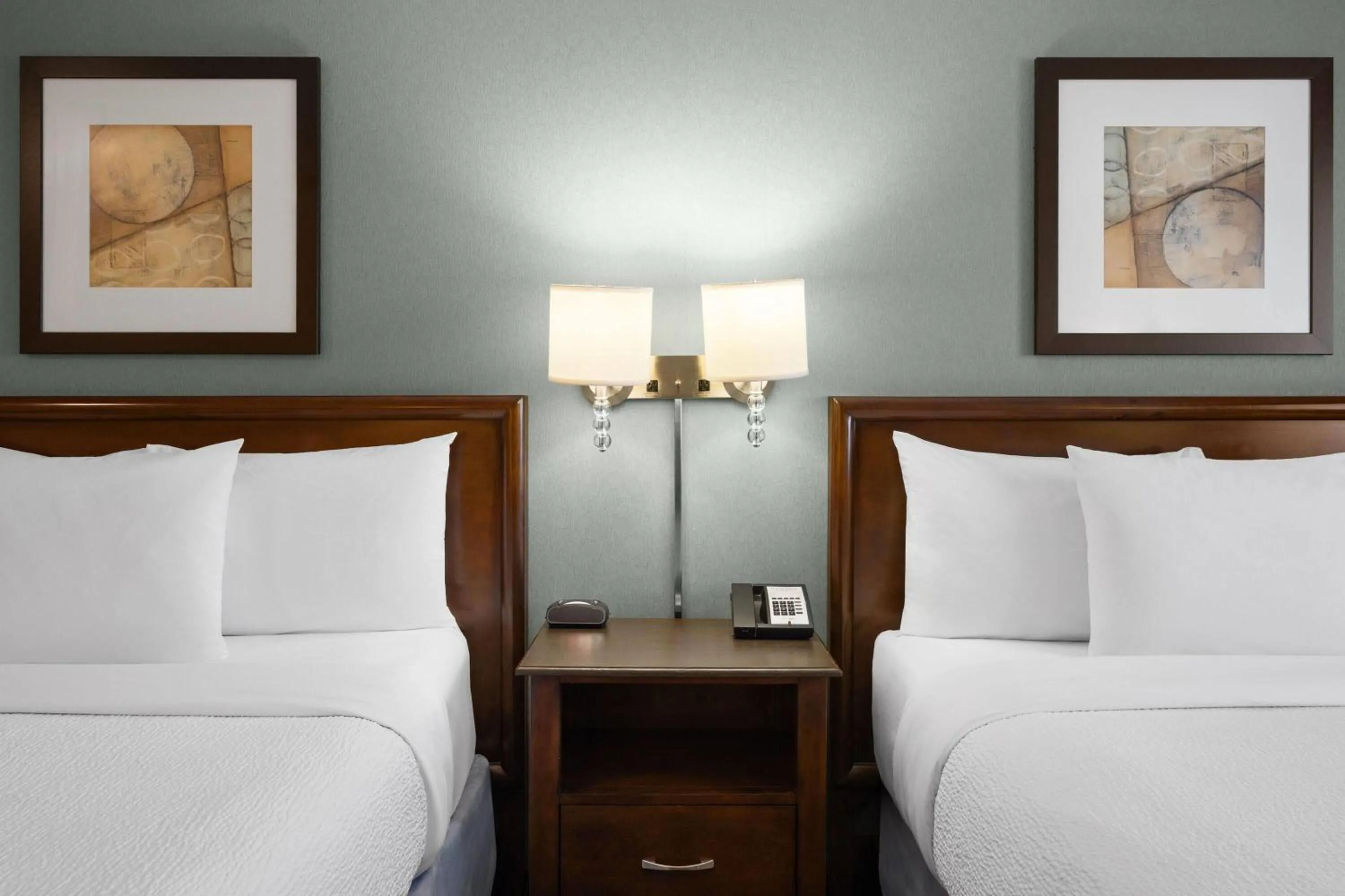 Photo of the whole room, Bed in Ramada by Wyndham Saskatoon