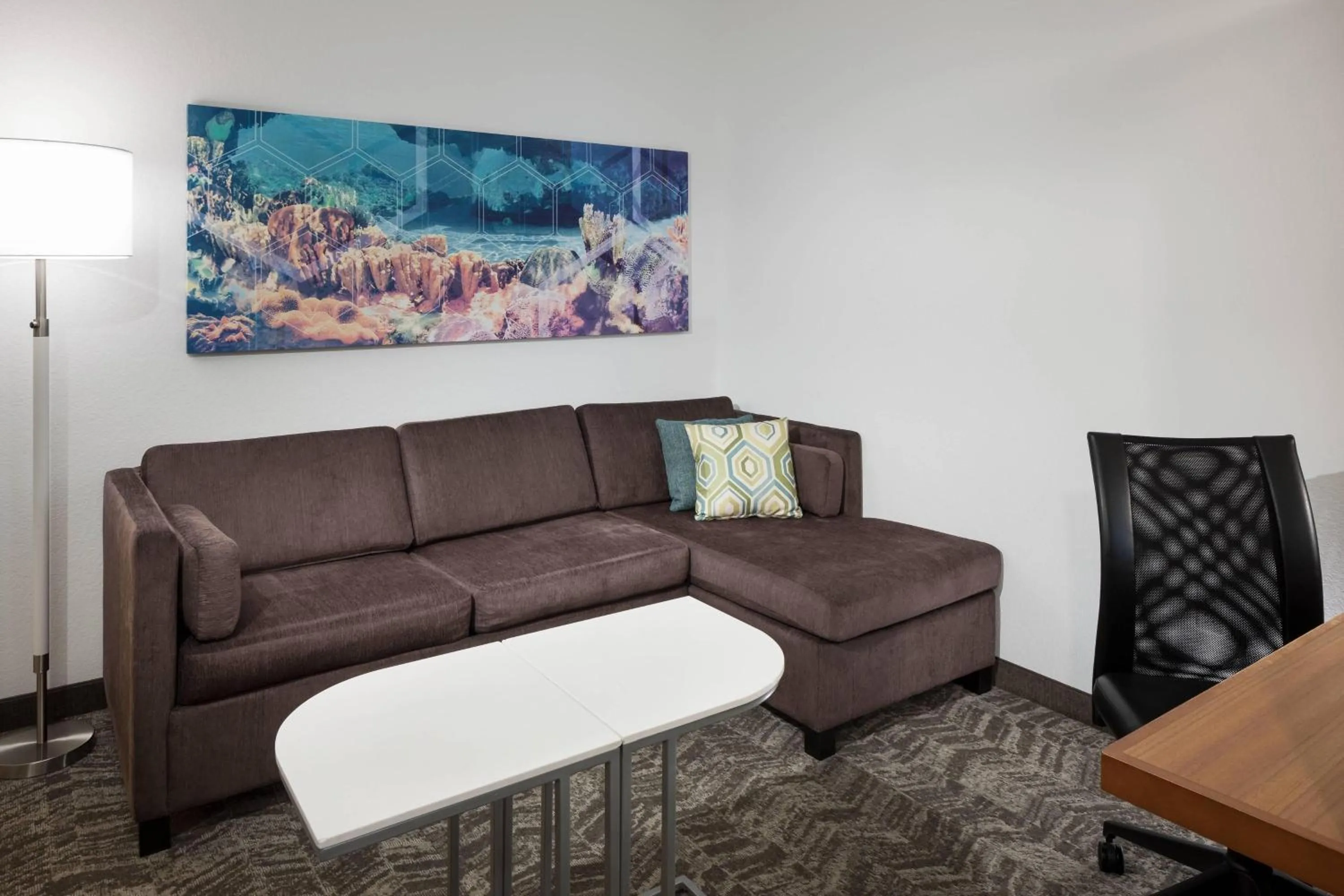 Living room in SpringHill Suites by Marriott Orlando at SeaWorld