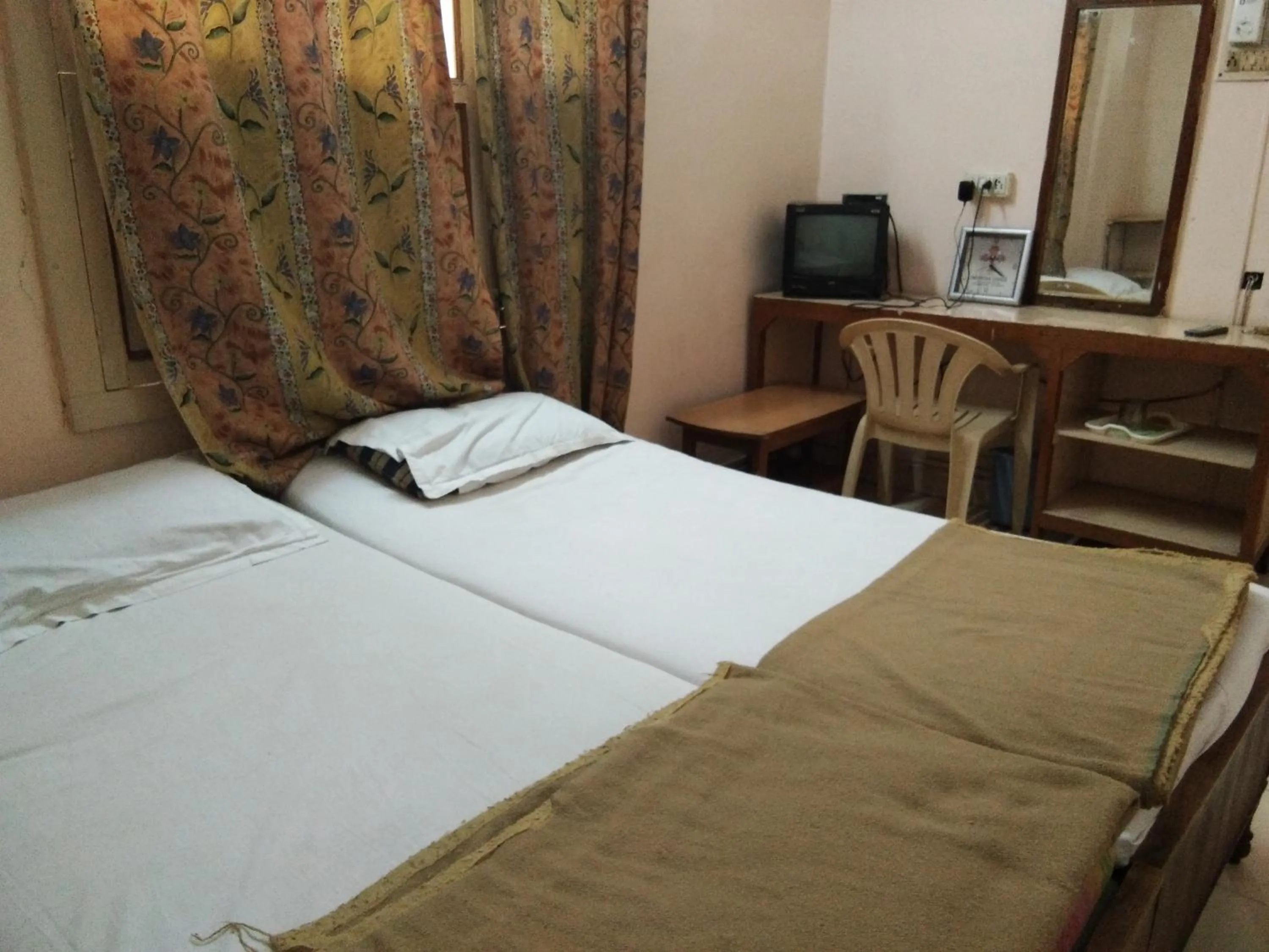 Bedroom in Srinivasa Lodge