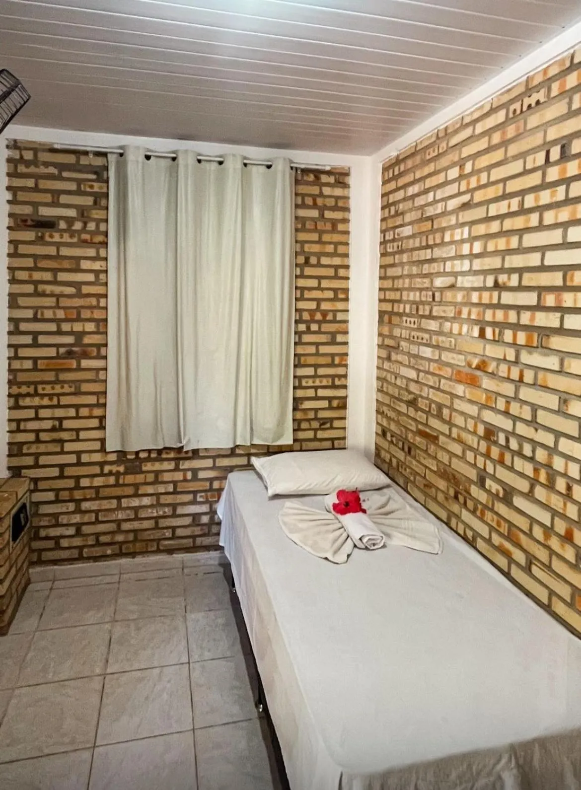 Bed in Pousada La Goduria