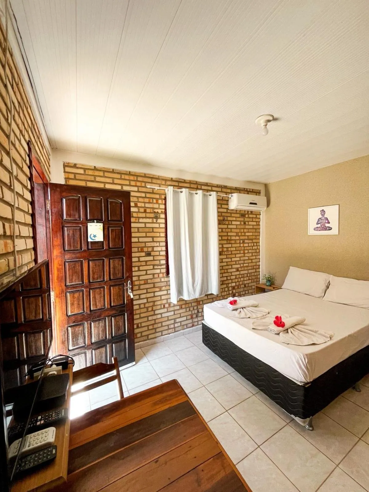 Bed in Pousada La Goduria