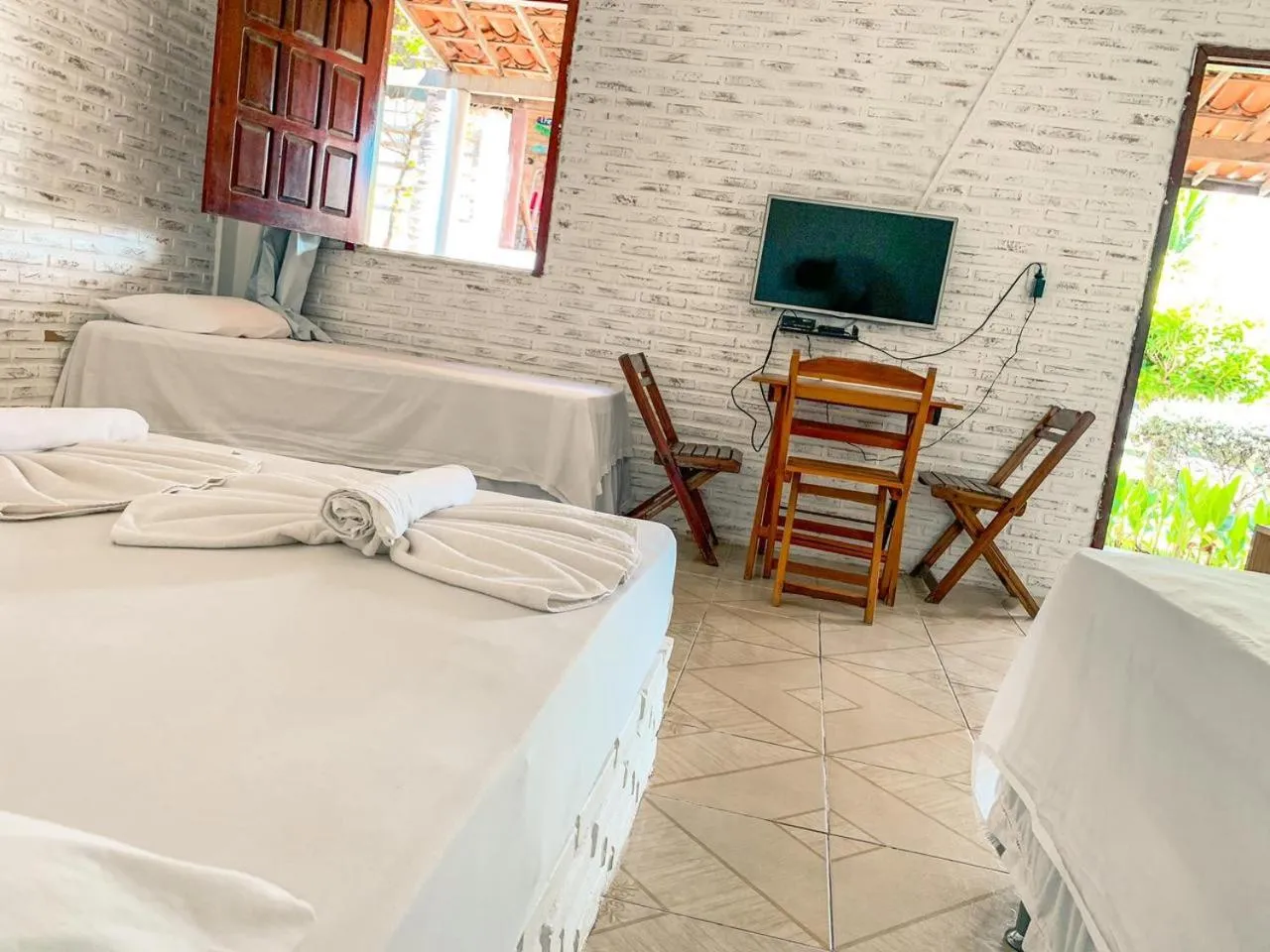 Bed in Pousada La Goduria