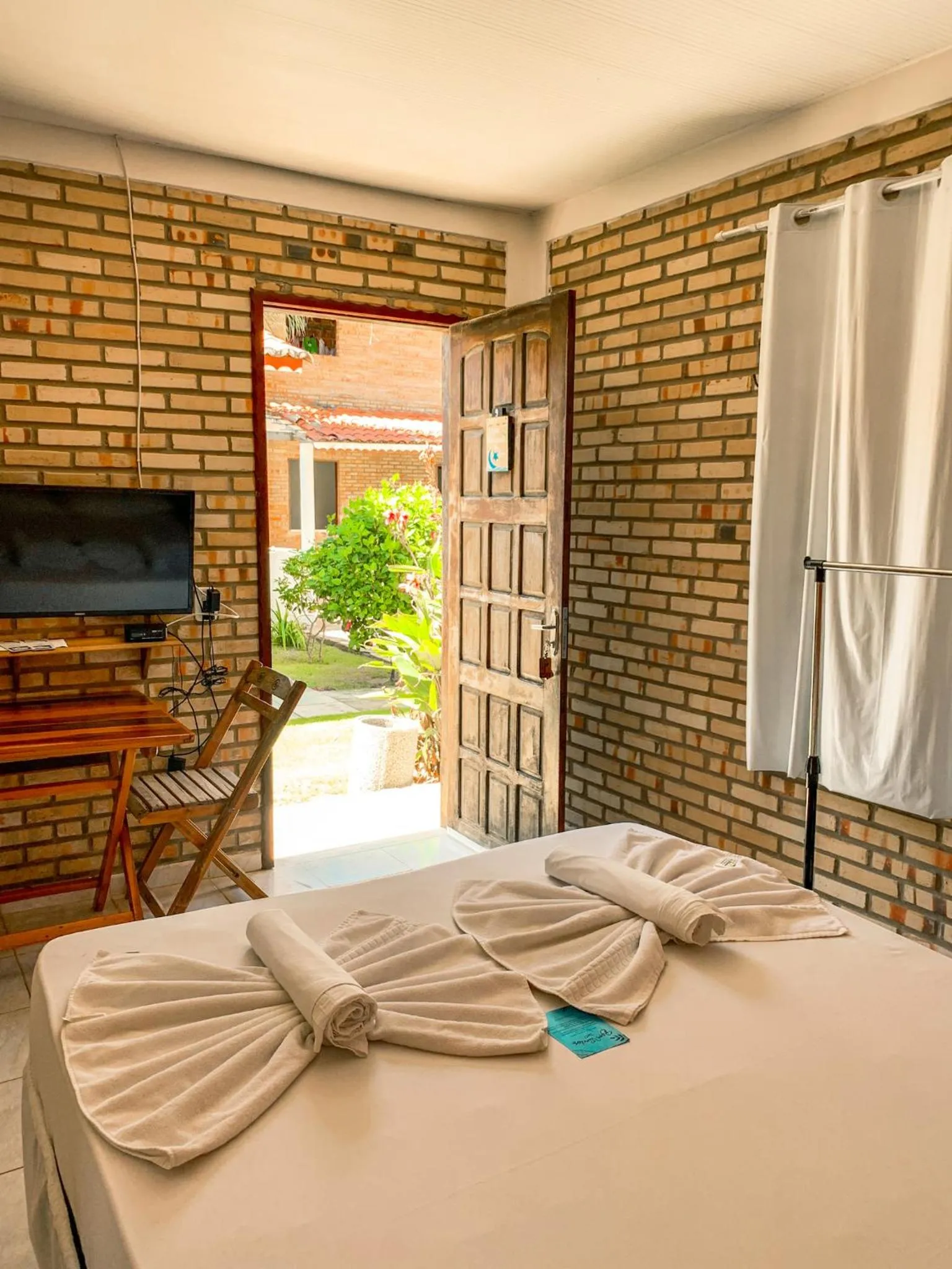 Bed in Pousada La Goduria