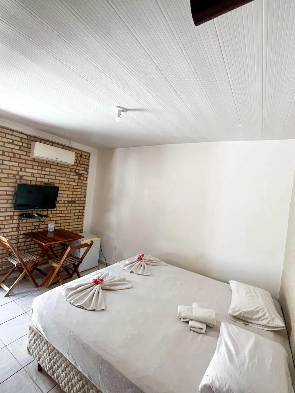 Bed in Pousada La Goduria