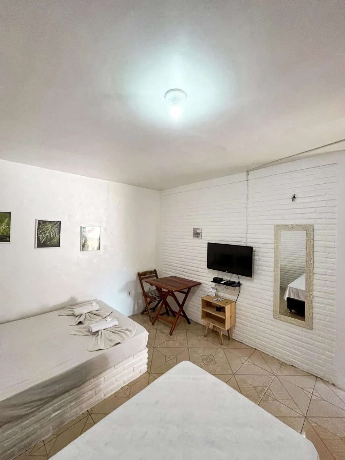 Bed in Pousada La Goduria