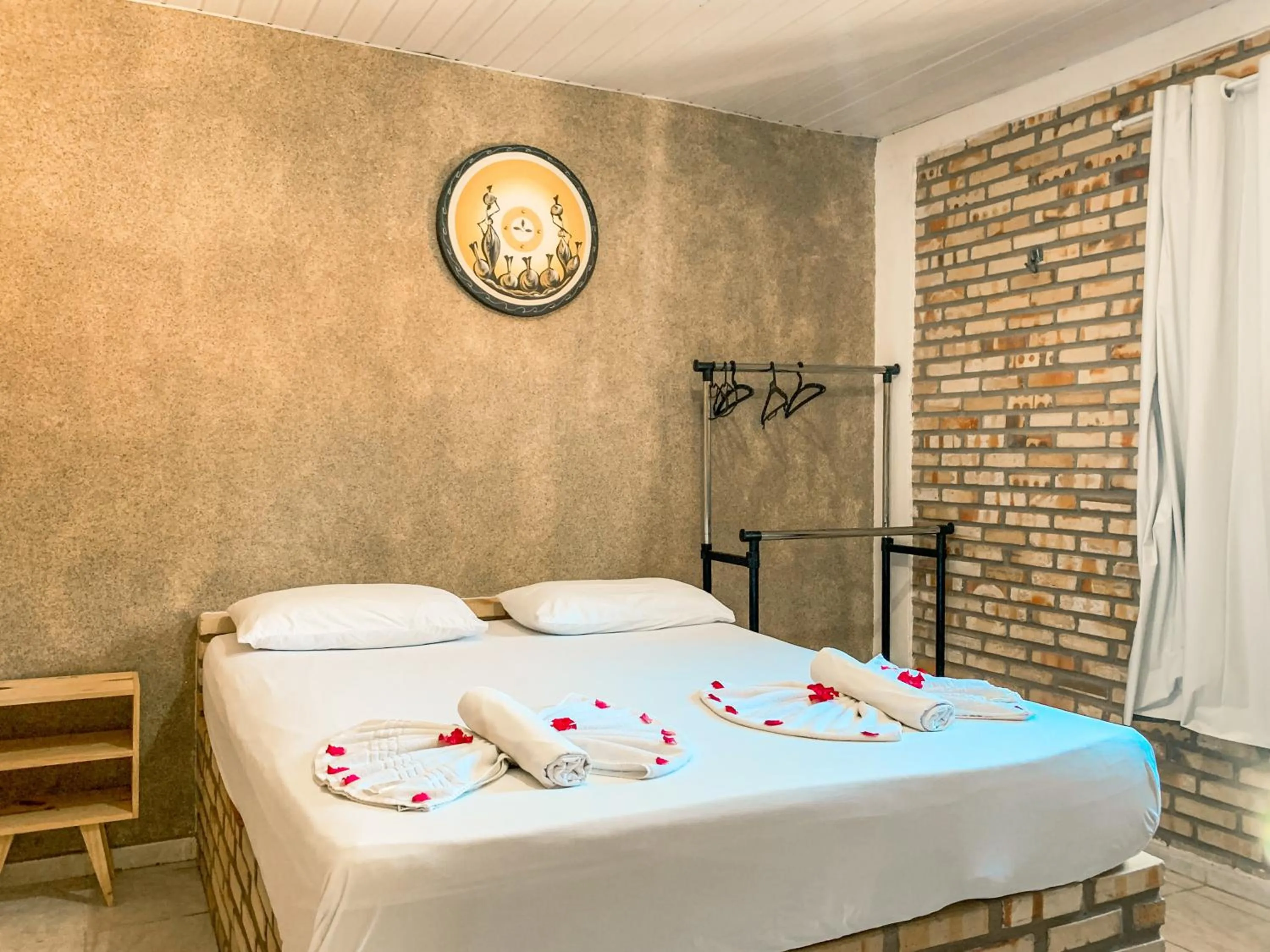 Bed in Pousada La Goduria