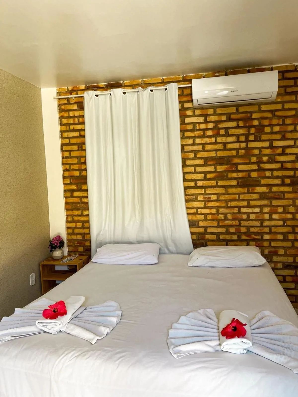 Bed in Pousada La Goduria