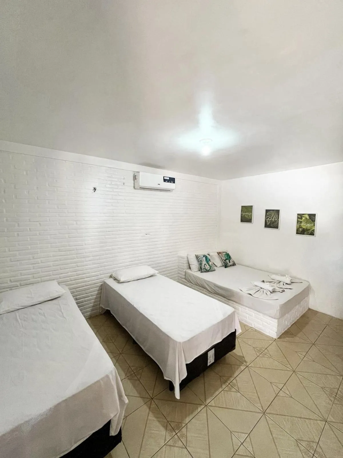 Bed in Pousada La Goduria