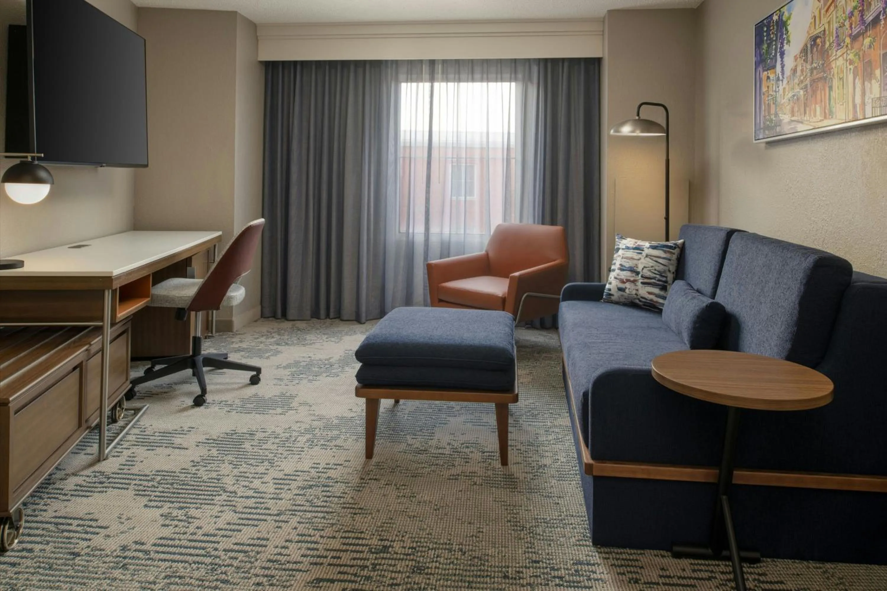 Living room in Courtyard by Marriott New Orleans Warehouse Arts District