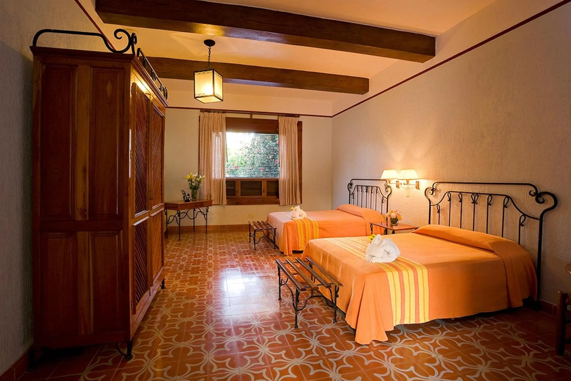 Photo of the whole room, Bed in Hacienda Uxmal Plantation & Museum