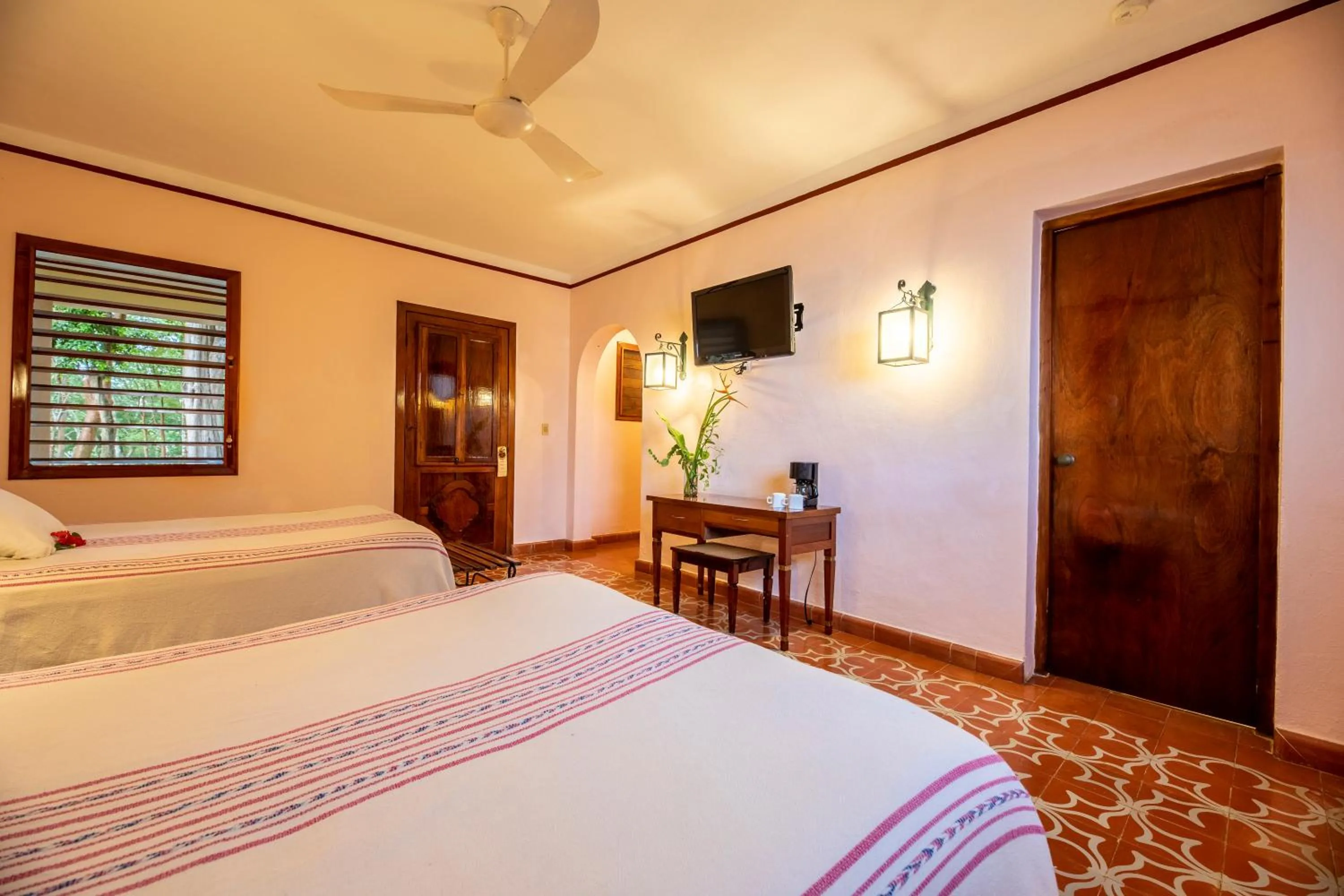 Photo of the whole room, Bed in Hacienda Uxmal Plantation & Museum