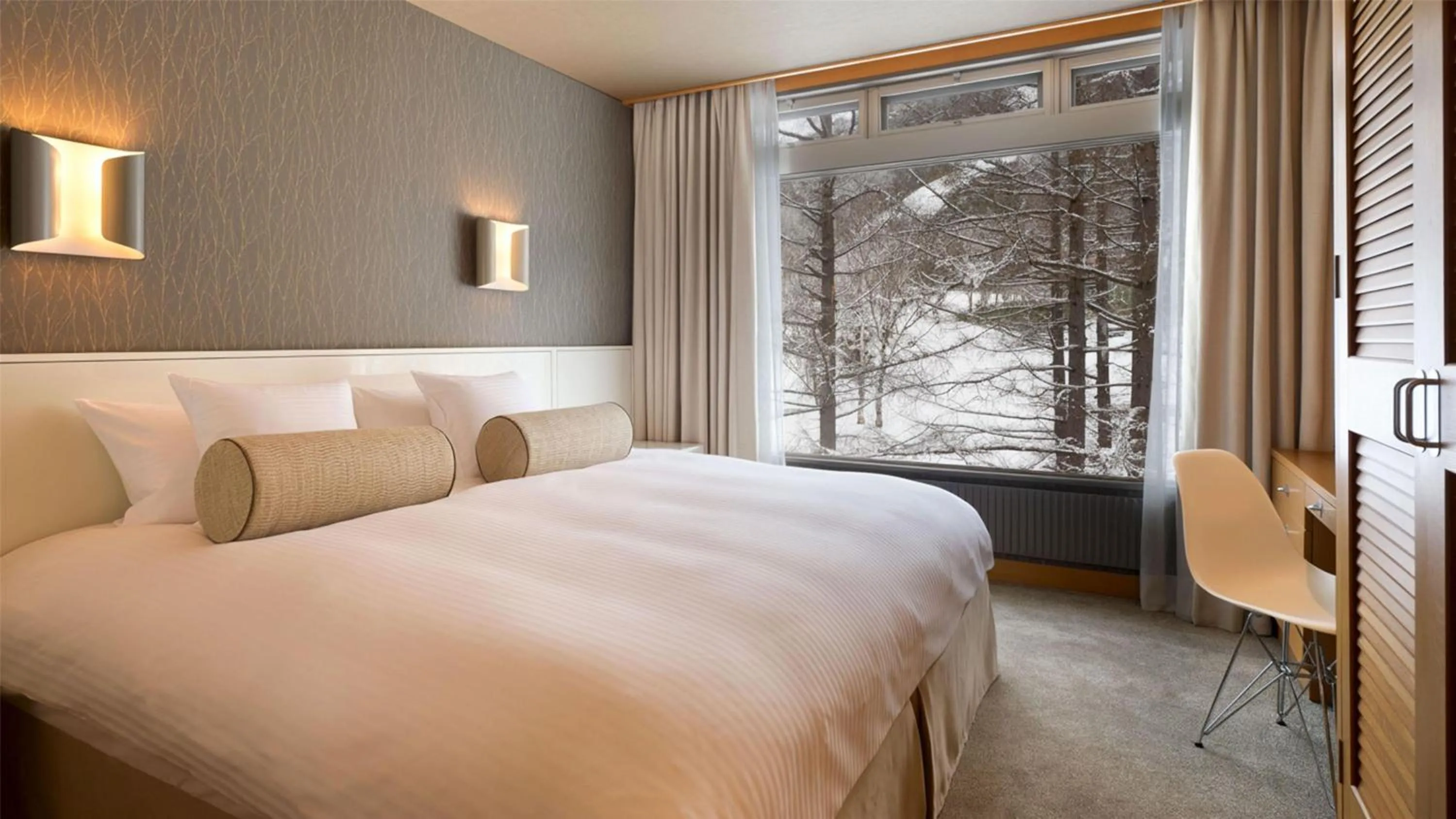 Bed in The Green Leaf Niseko Village, Tapestry Collection by Hilton