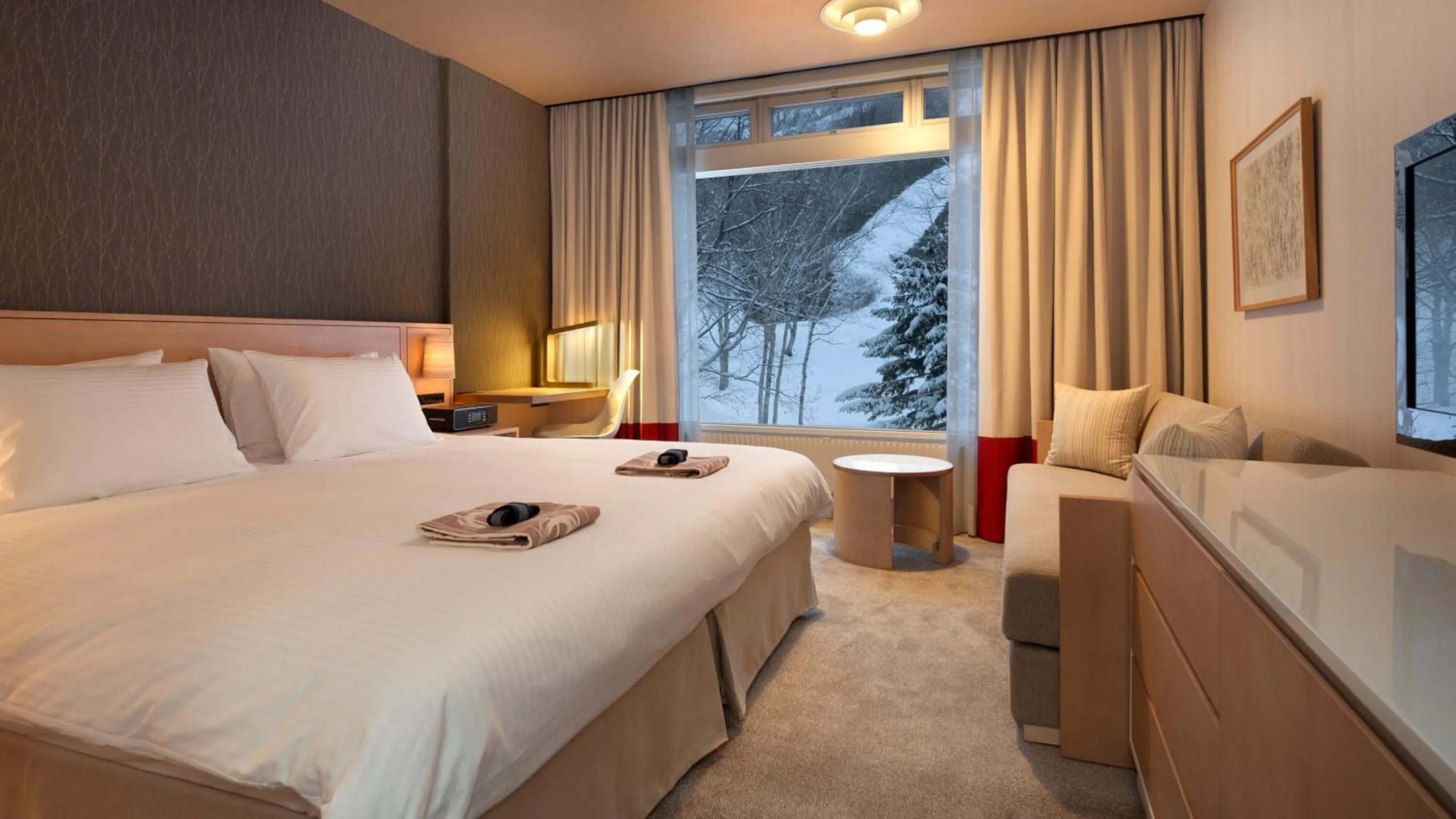 Photo of the whole room, Bed in The Green Leaf Niseko Village, Tapestry Collection by Hilton