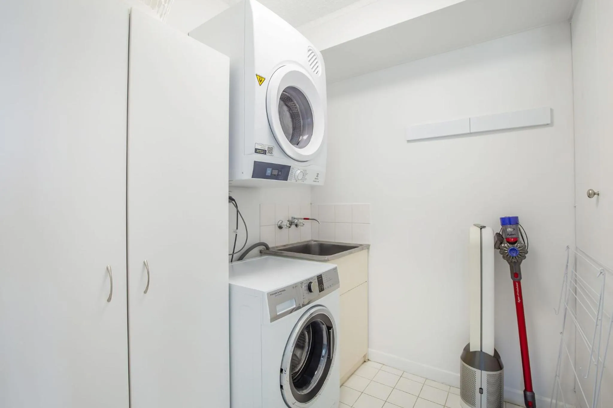 washing machine in Horizons Holiday Apartments - OFFICIAL