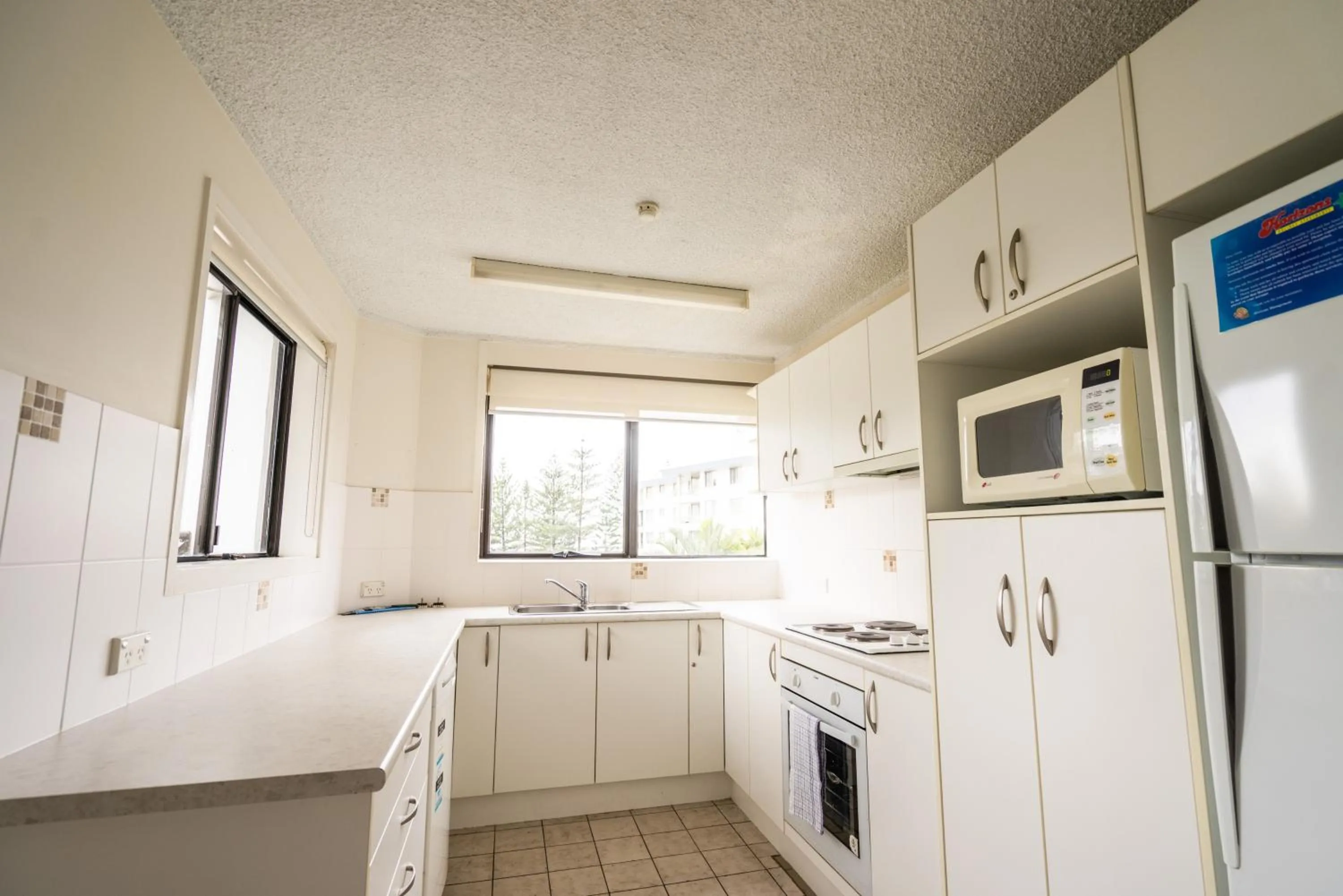 Kitchen or kitchenette in Horizons Holiday Apartments - OFFICIAL
