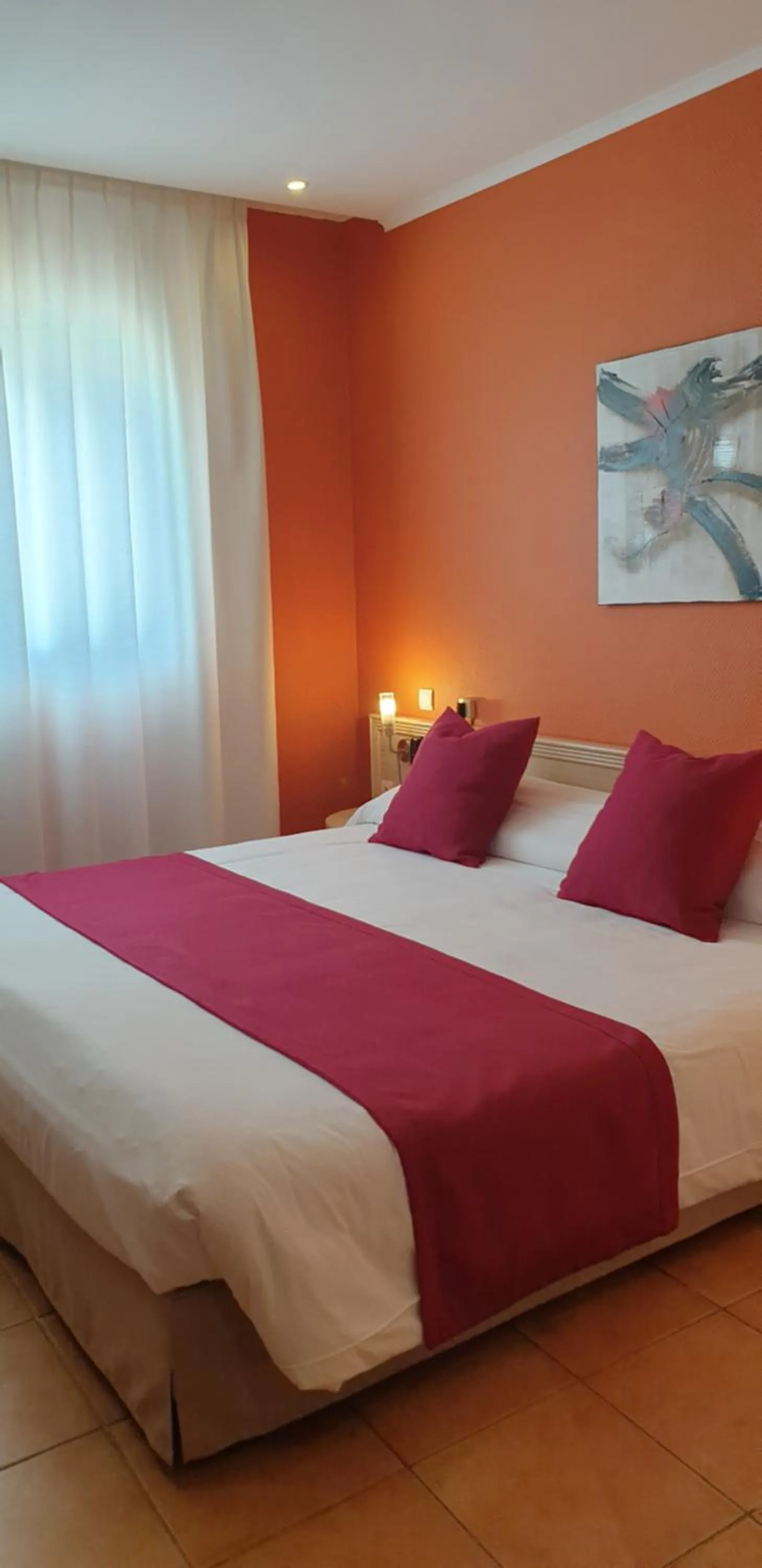 Bed in Logis Hôtel & Restaurant Le Fleurance