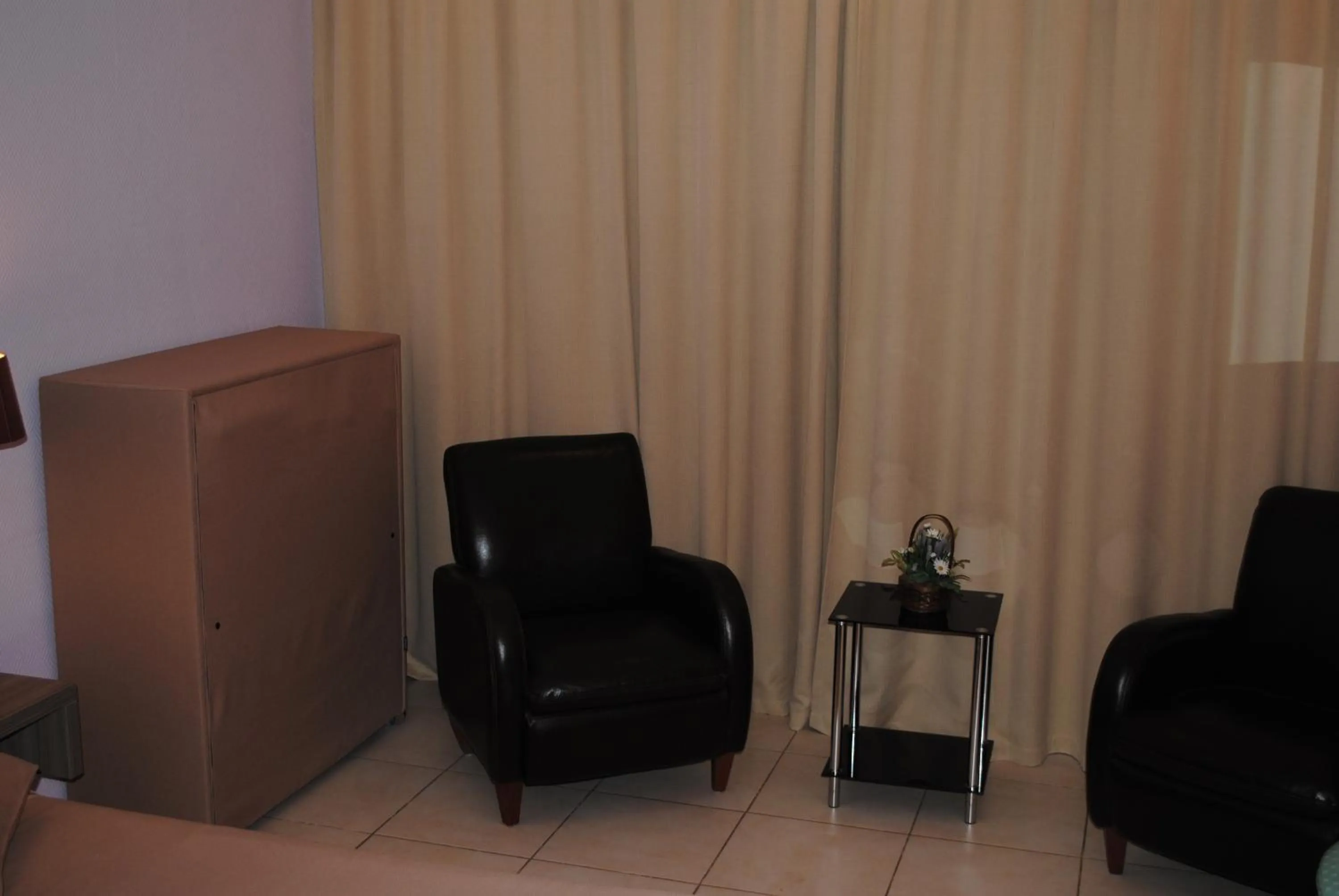 Seating area in Logis Hôtel & Restaurant Le Fleurance