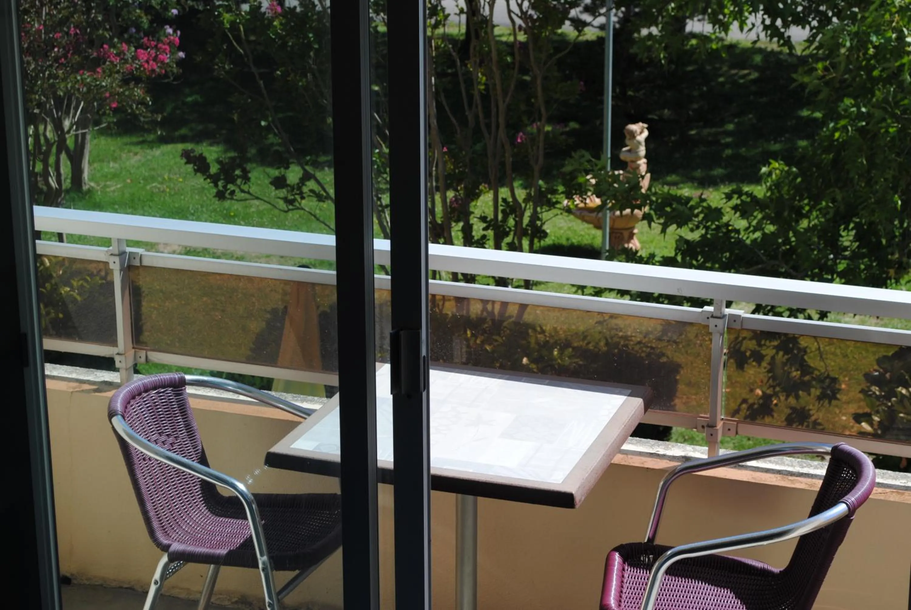 Balcony/Terrace in Logis Hôtel & Restaurant Le Fleurance