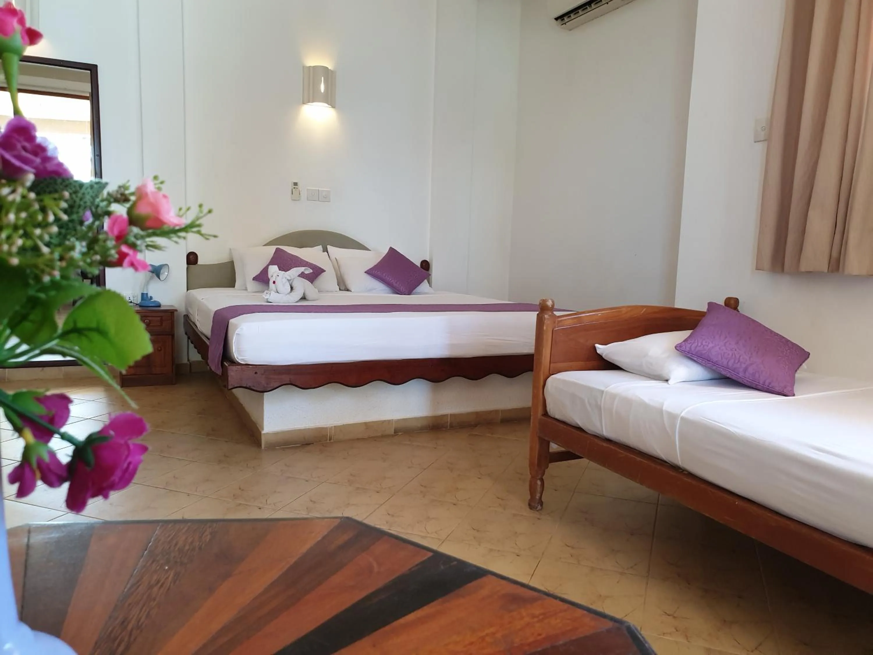 Bed in Oasey Beach Hotel