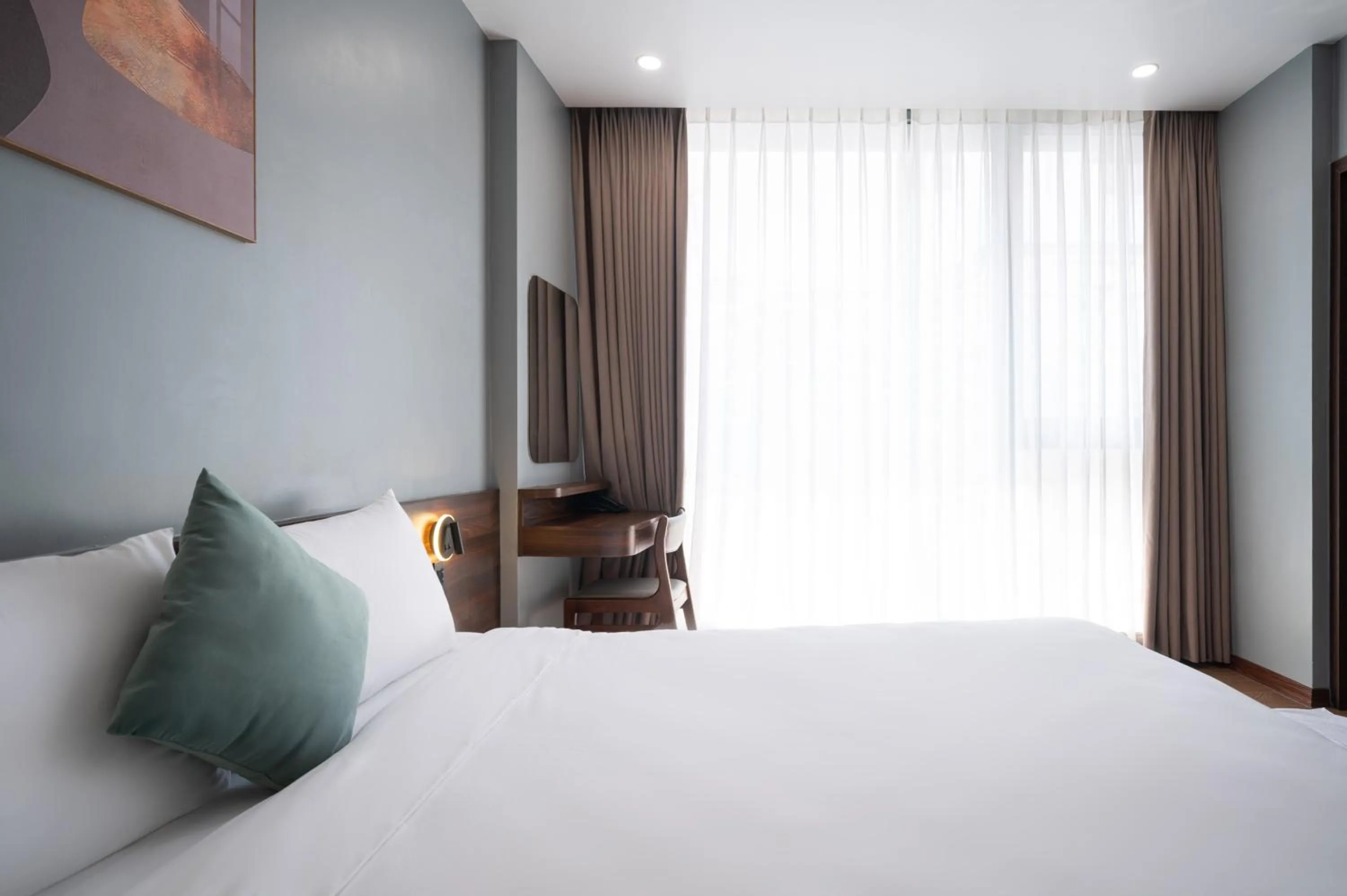 Bed in Eden Hue Hotel