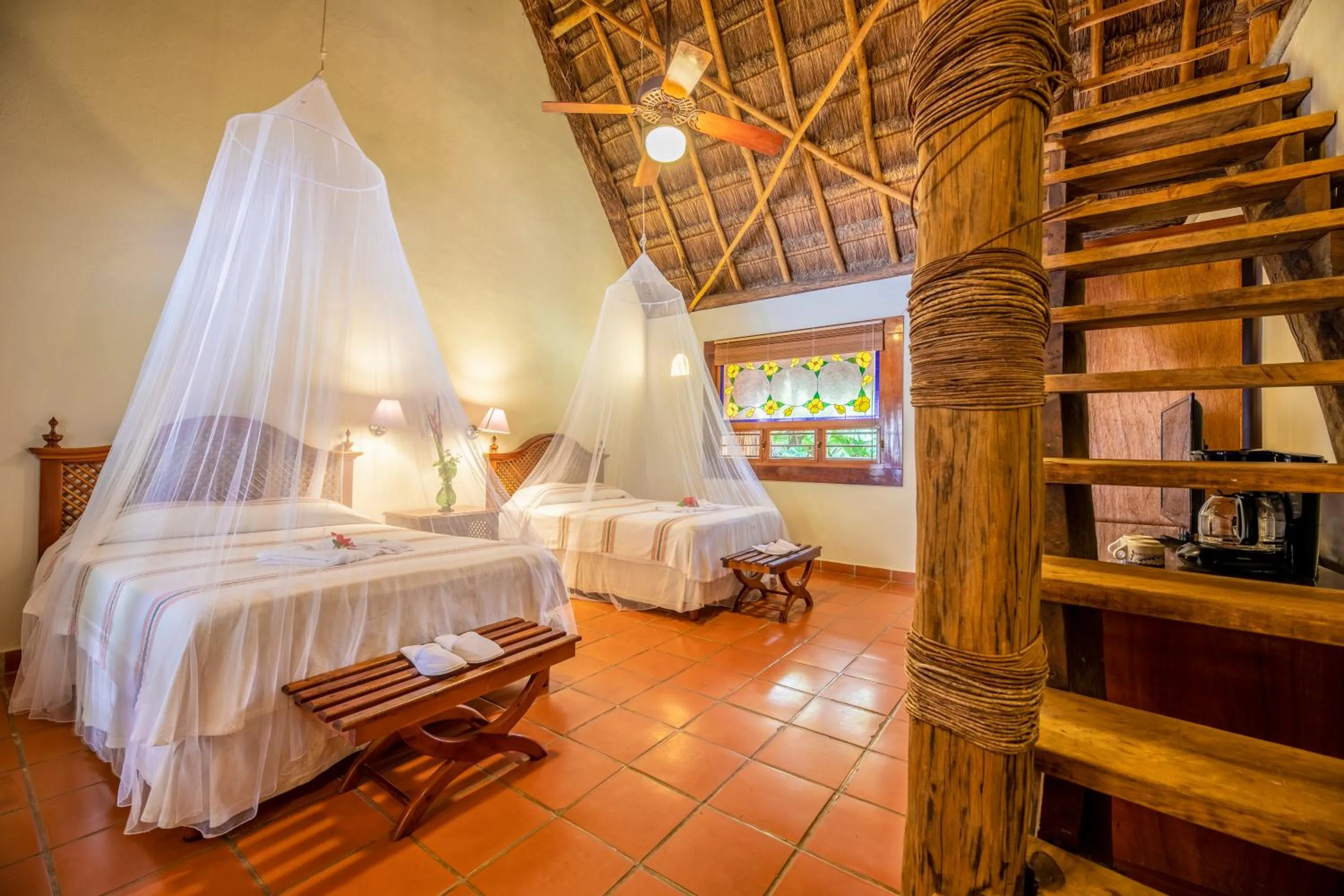 Photo of the whole room, Bed in The Lodge At Uxmal