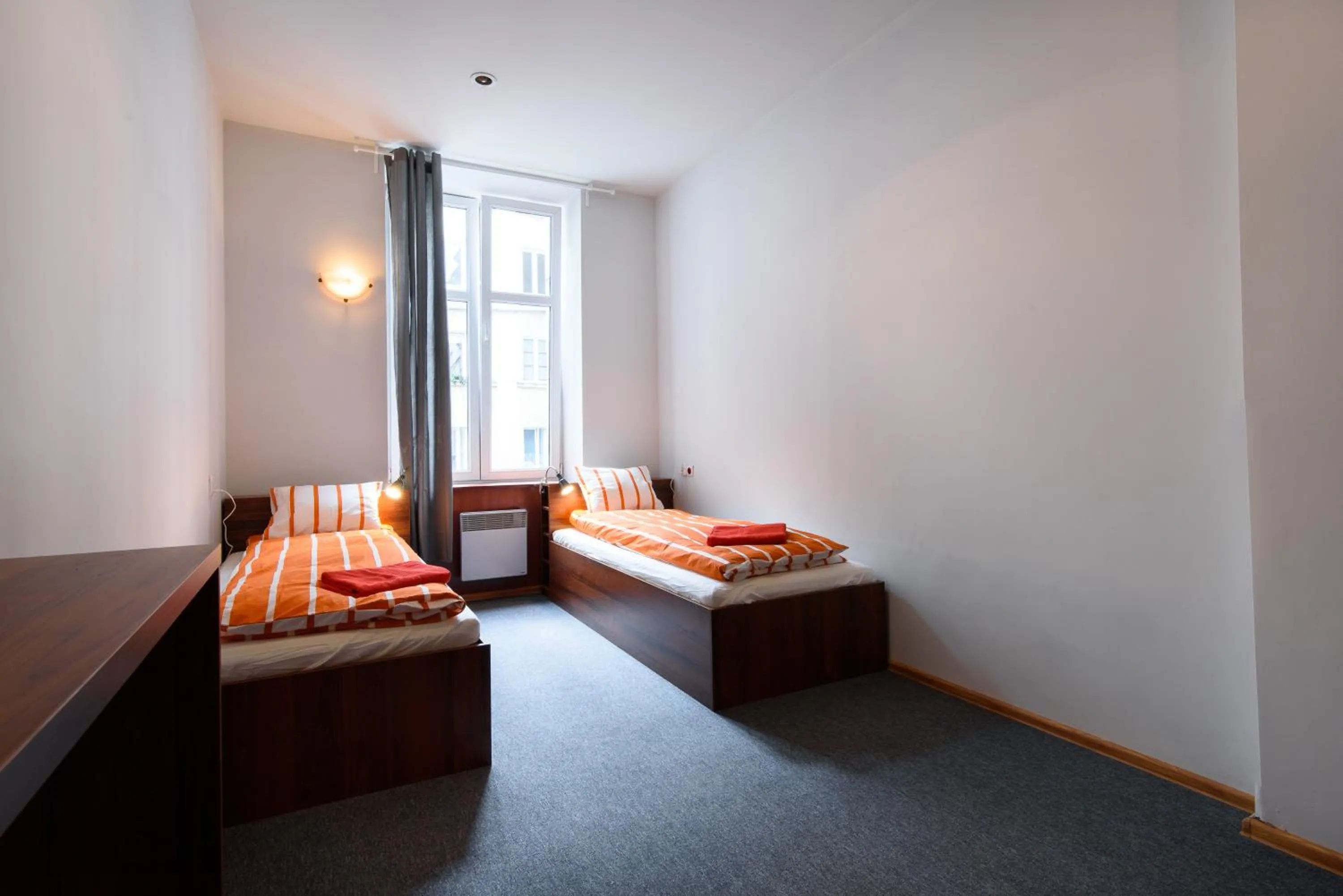 Bed in Constitution Square Rooms