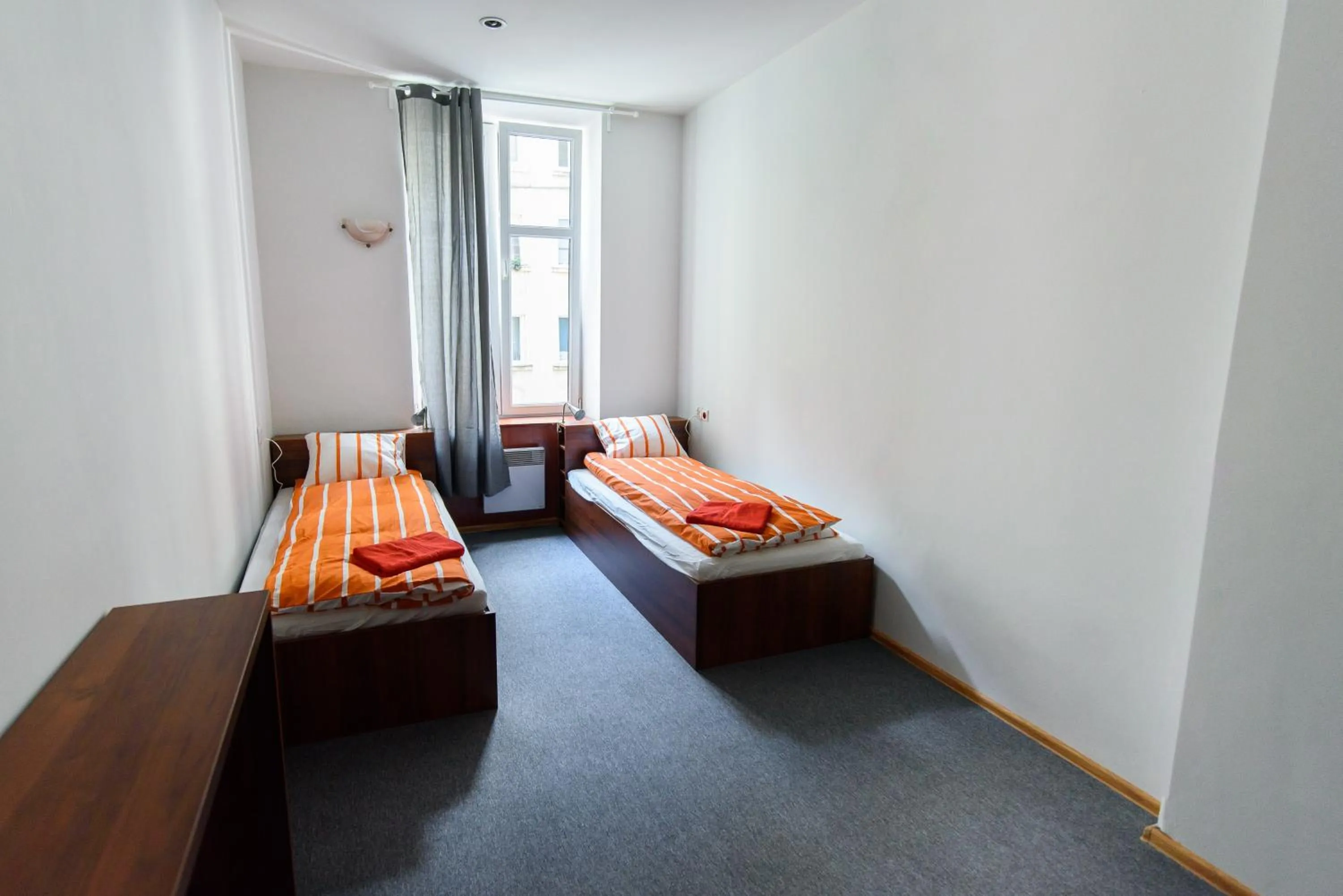 Bed in Constitution Square Rooms