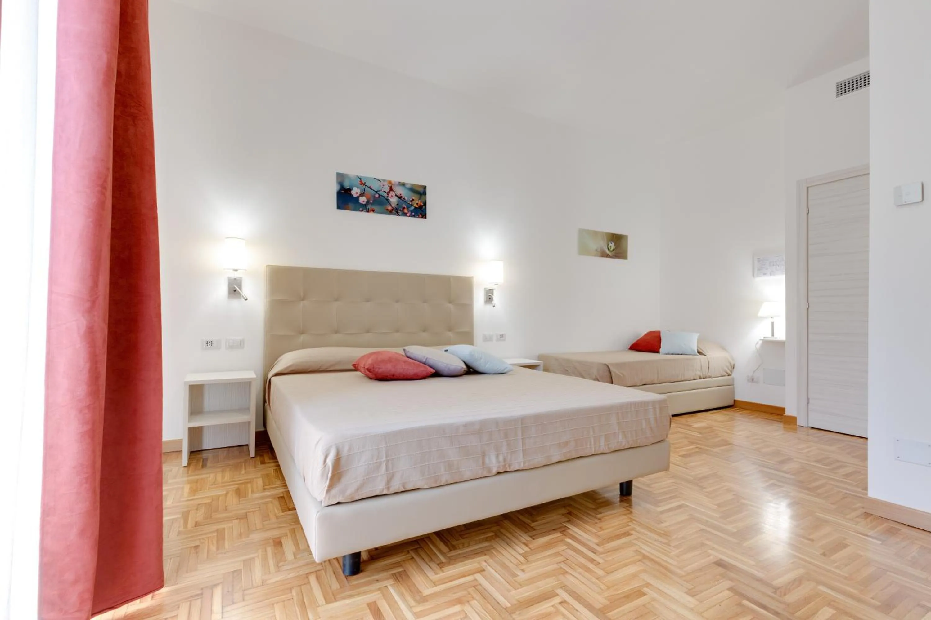 Bed in Dolce Luxury Rooms