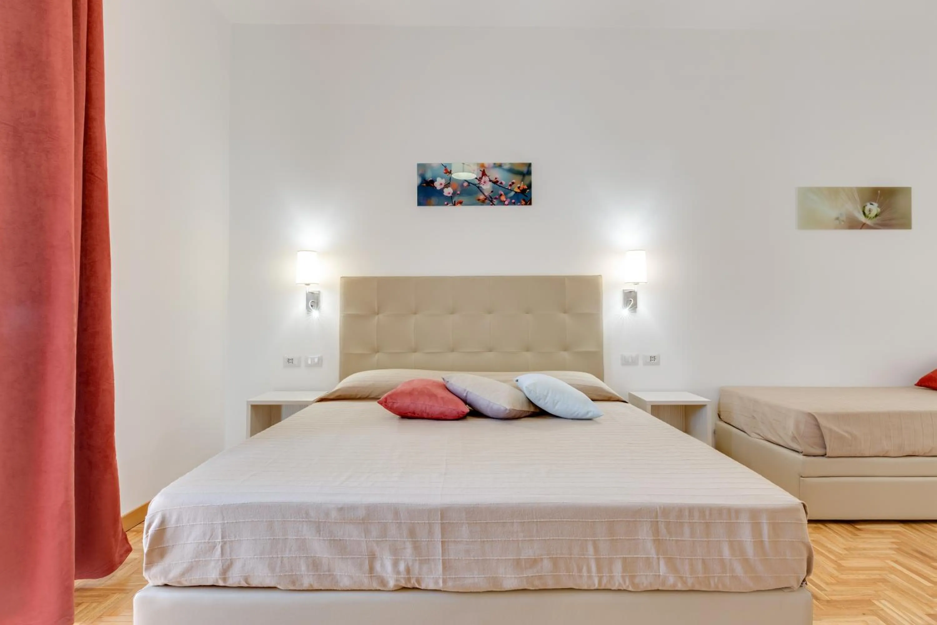 Bed in Dolce Luxury Rooms