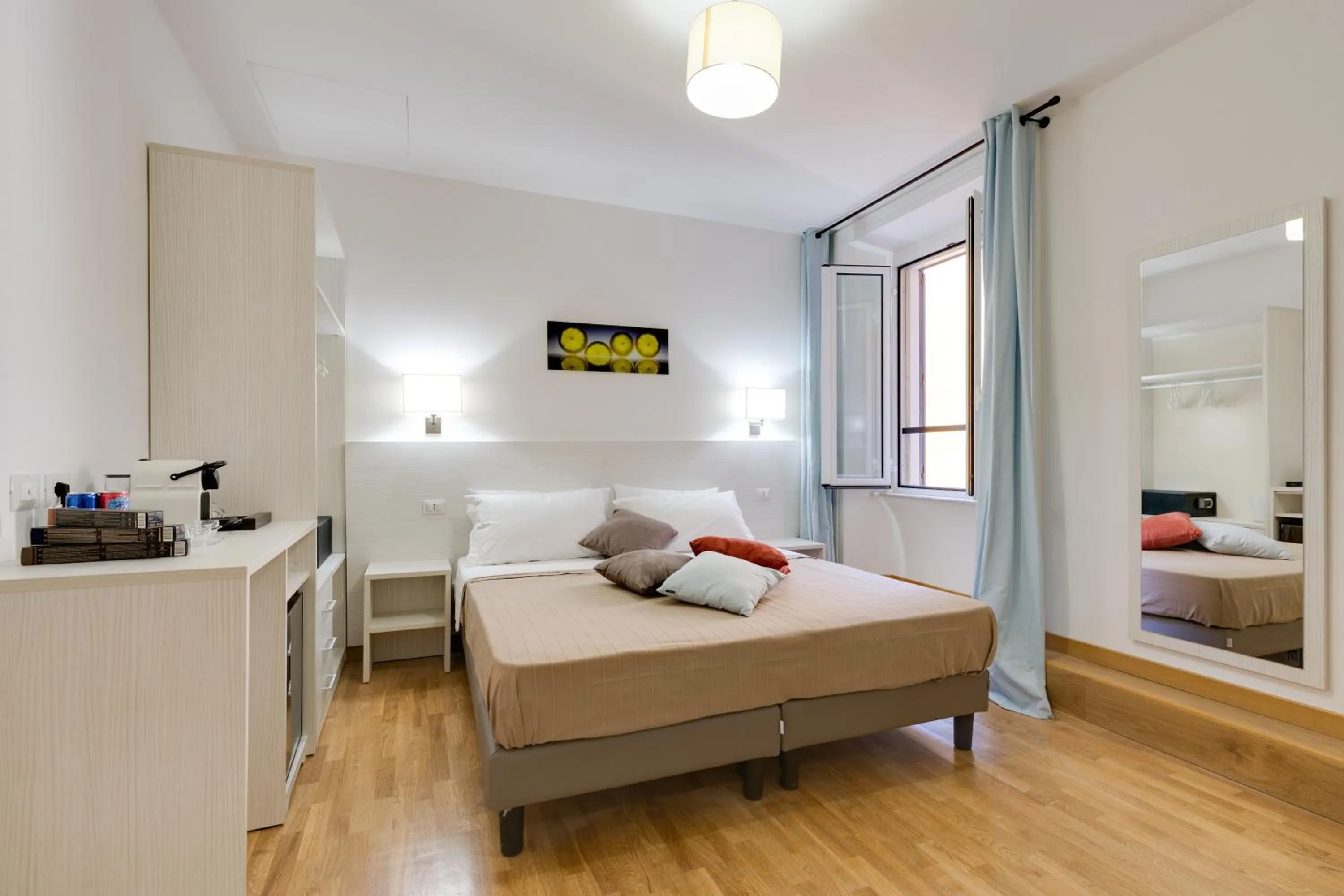 Bed in Dolce Luxury Rooms