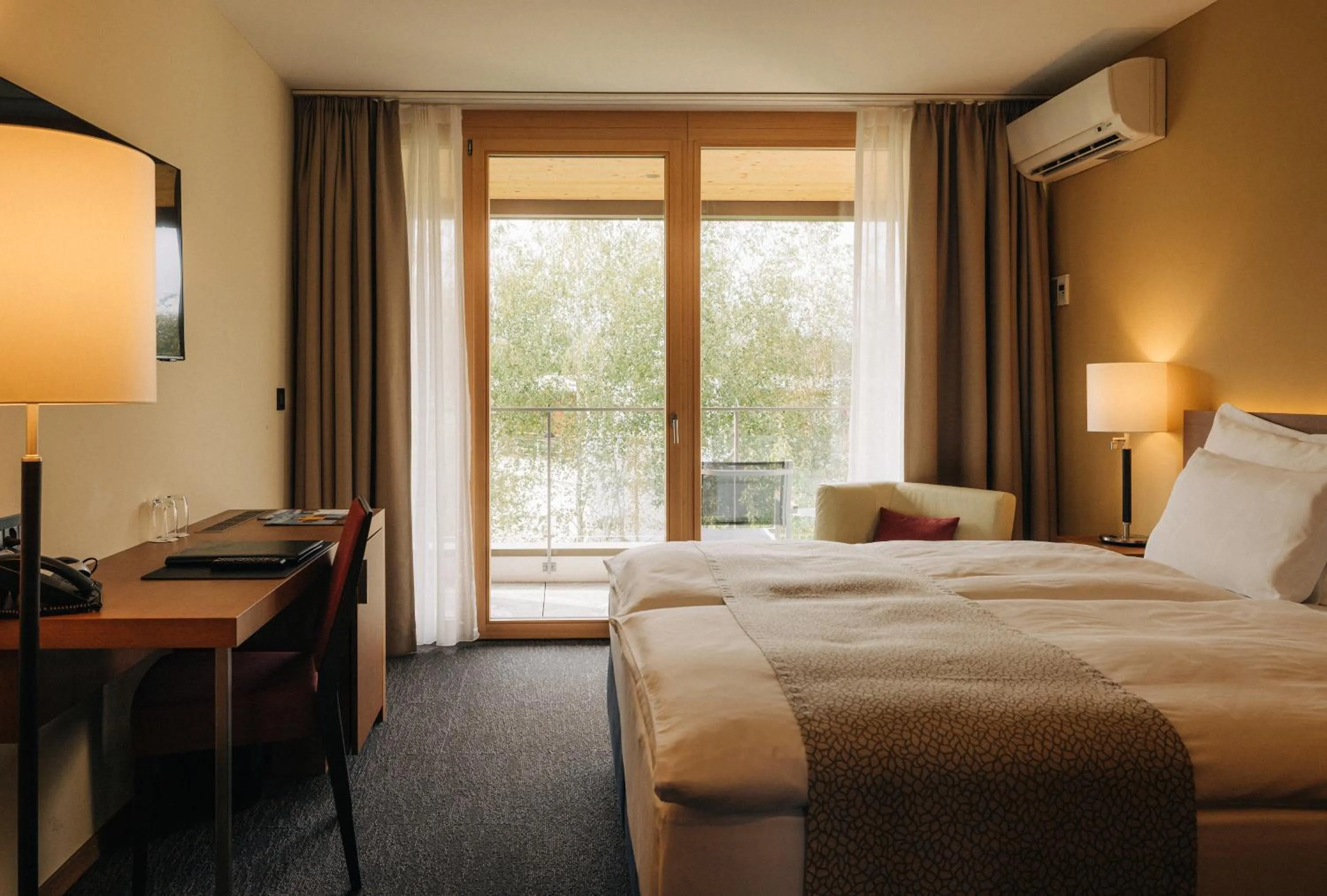 Bedroom, Bed in Deltapark Vitalresort****