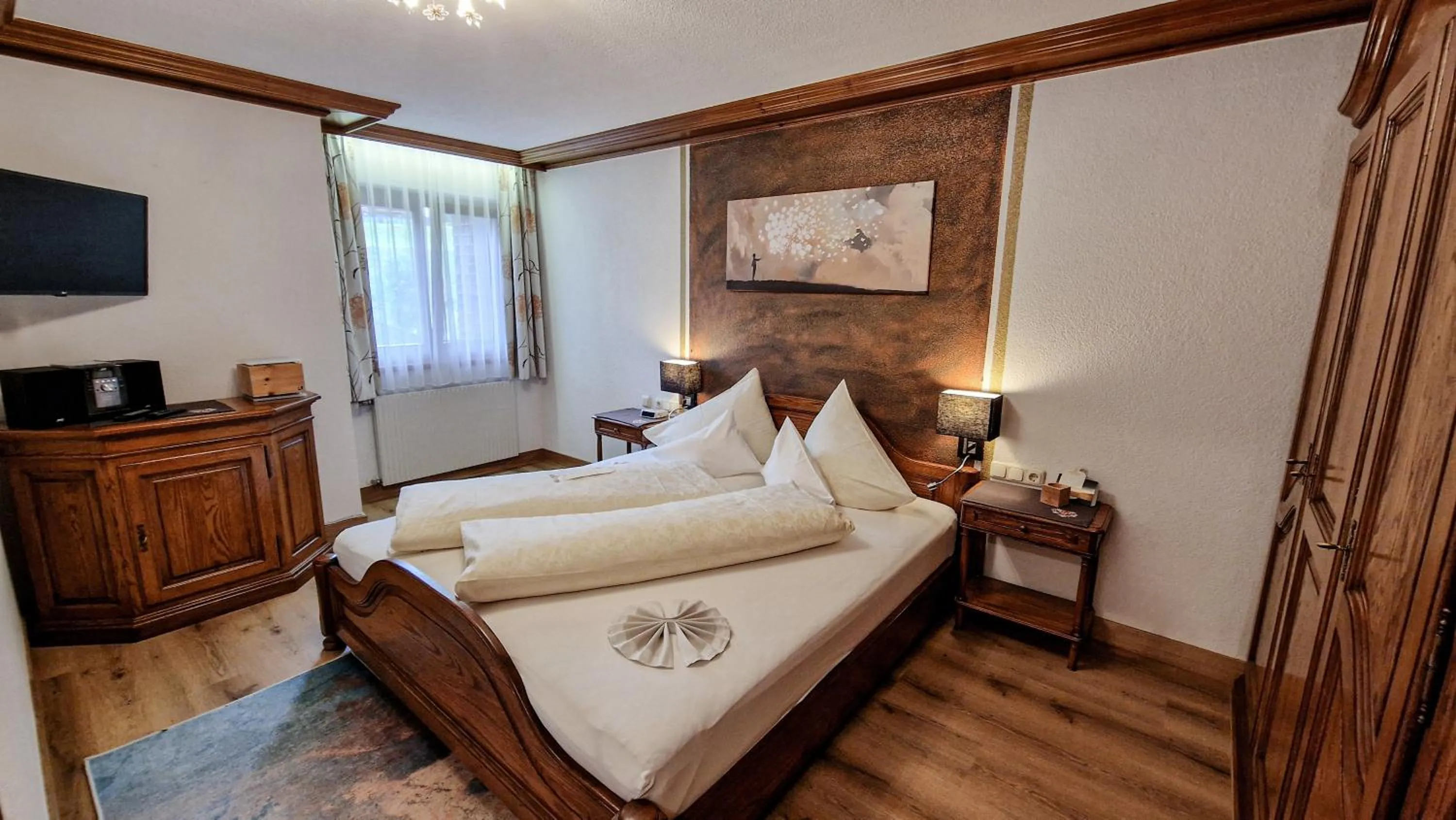 Photo of the whole room, Bed in Hotel Jagdhaus Monzabon