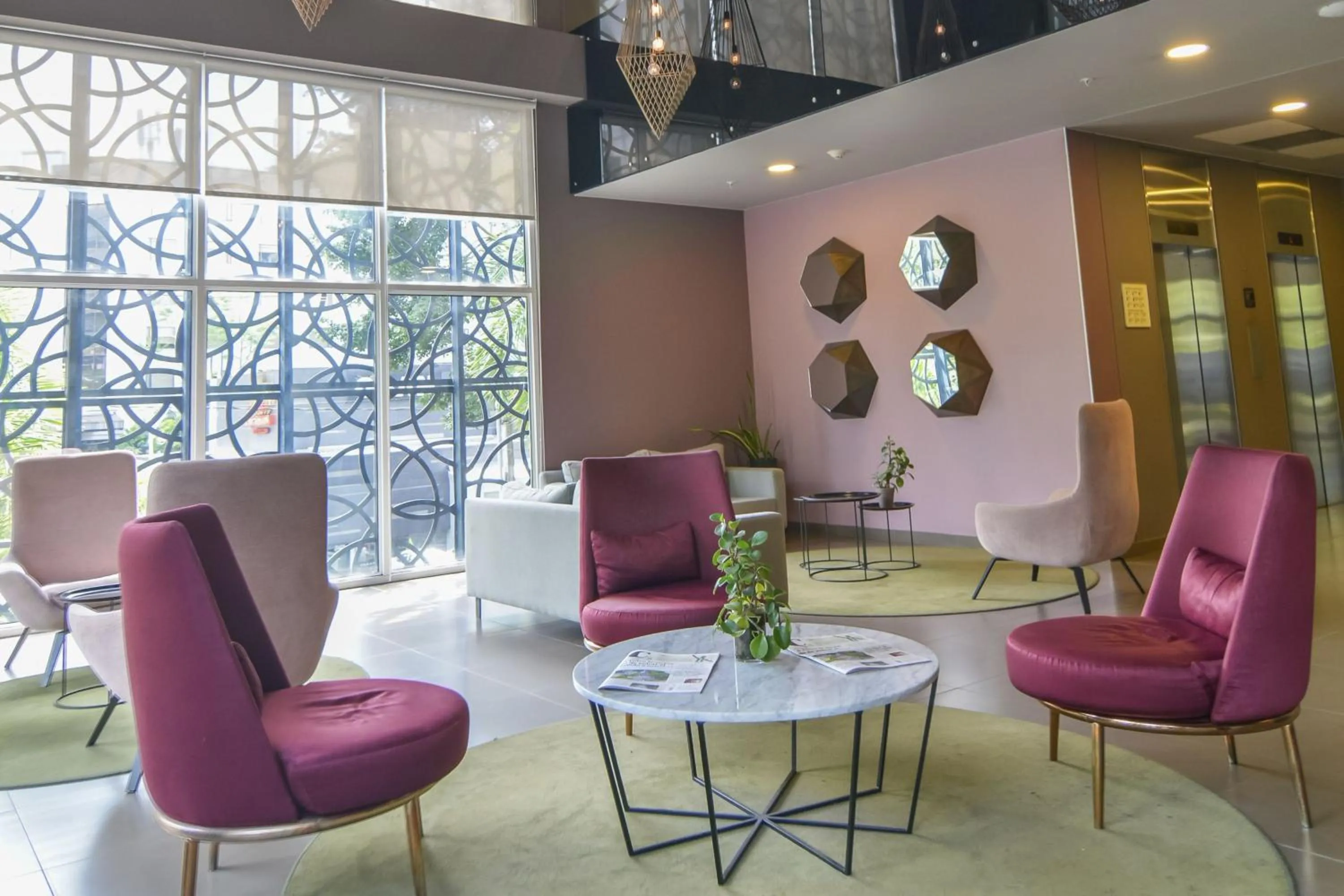 Lobby or reception in City Express Plus by Marriott Medellín Colombia