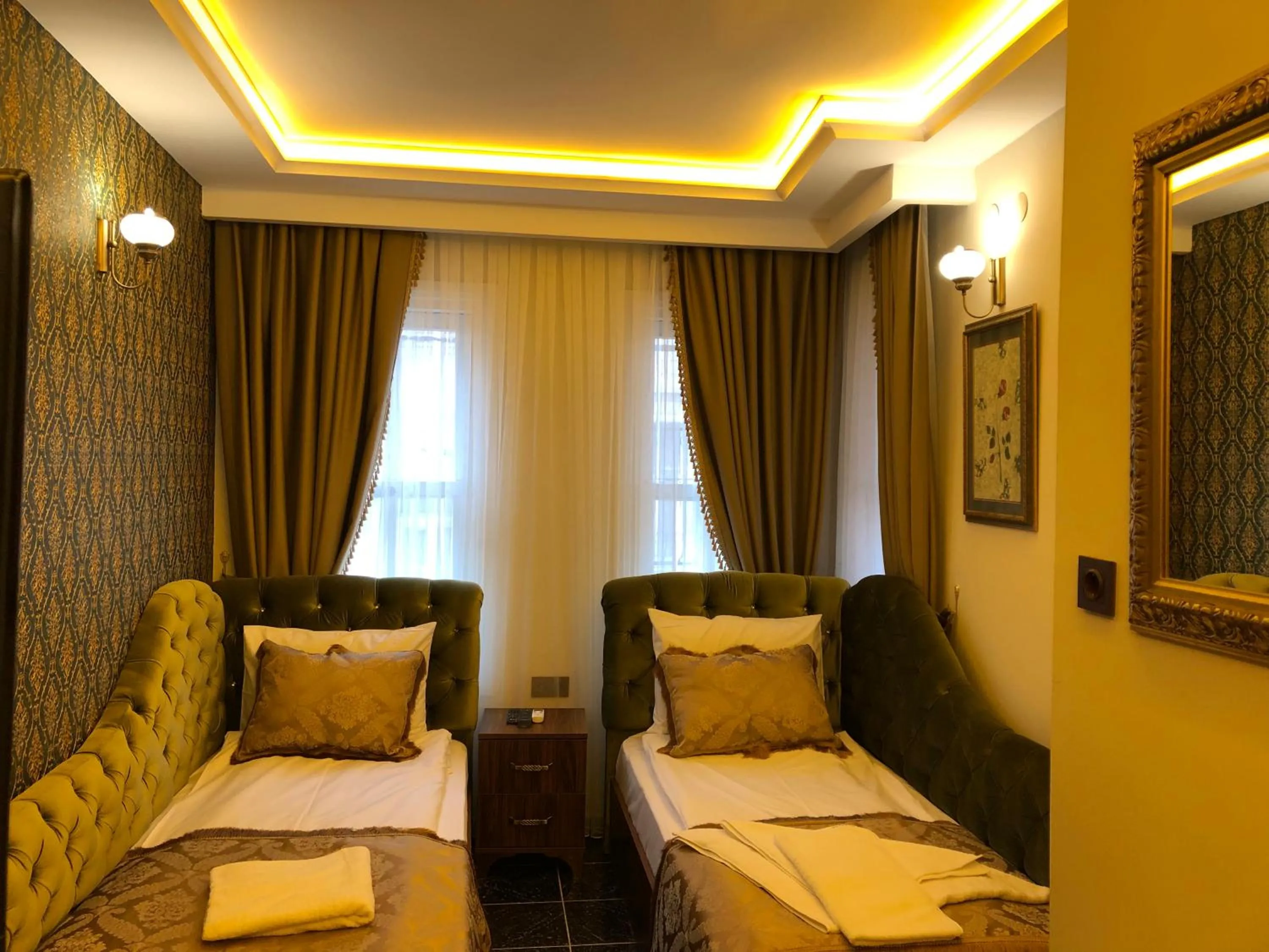 Living room, Bed in Rose Mansion by Otantik Suites