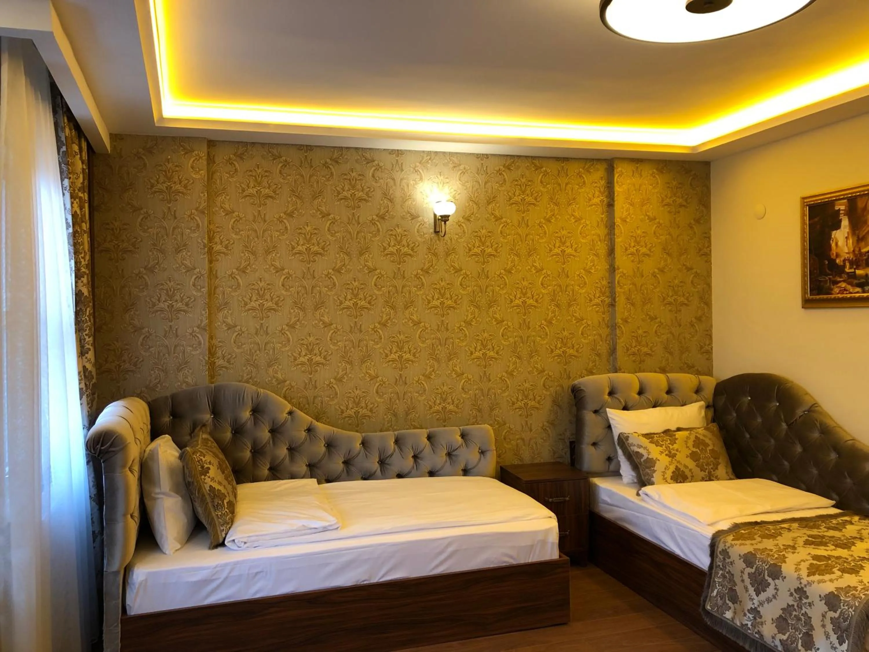 Living room, Bed in Rose Mansion by Otantik Suites