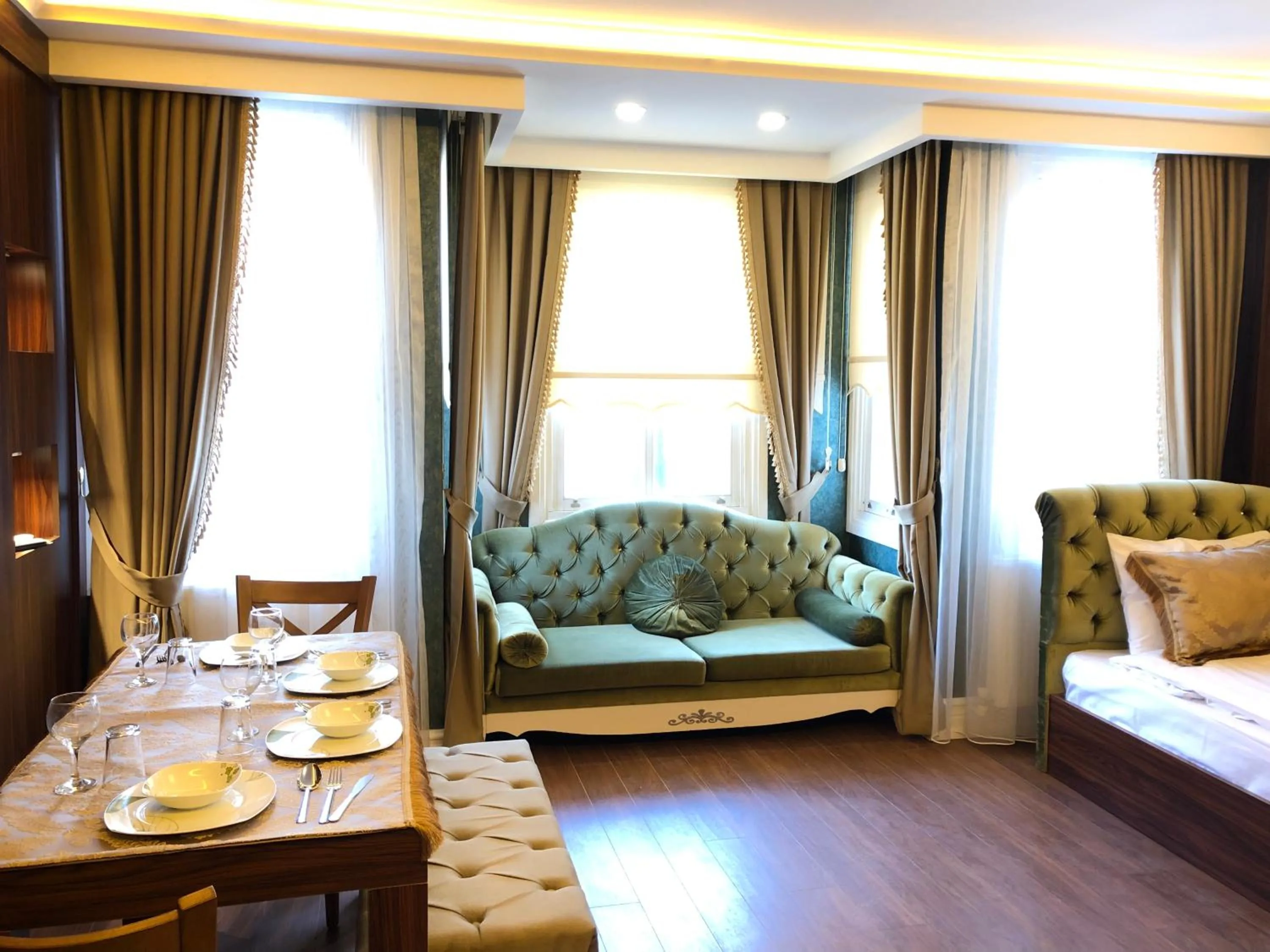 Living room in Rose Mansion by Otantik Suites