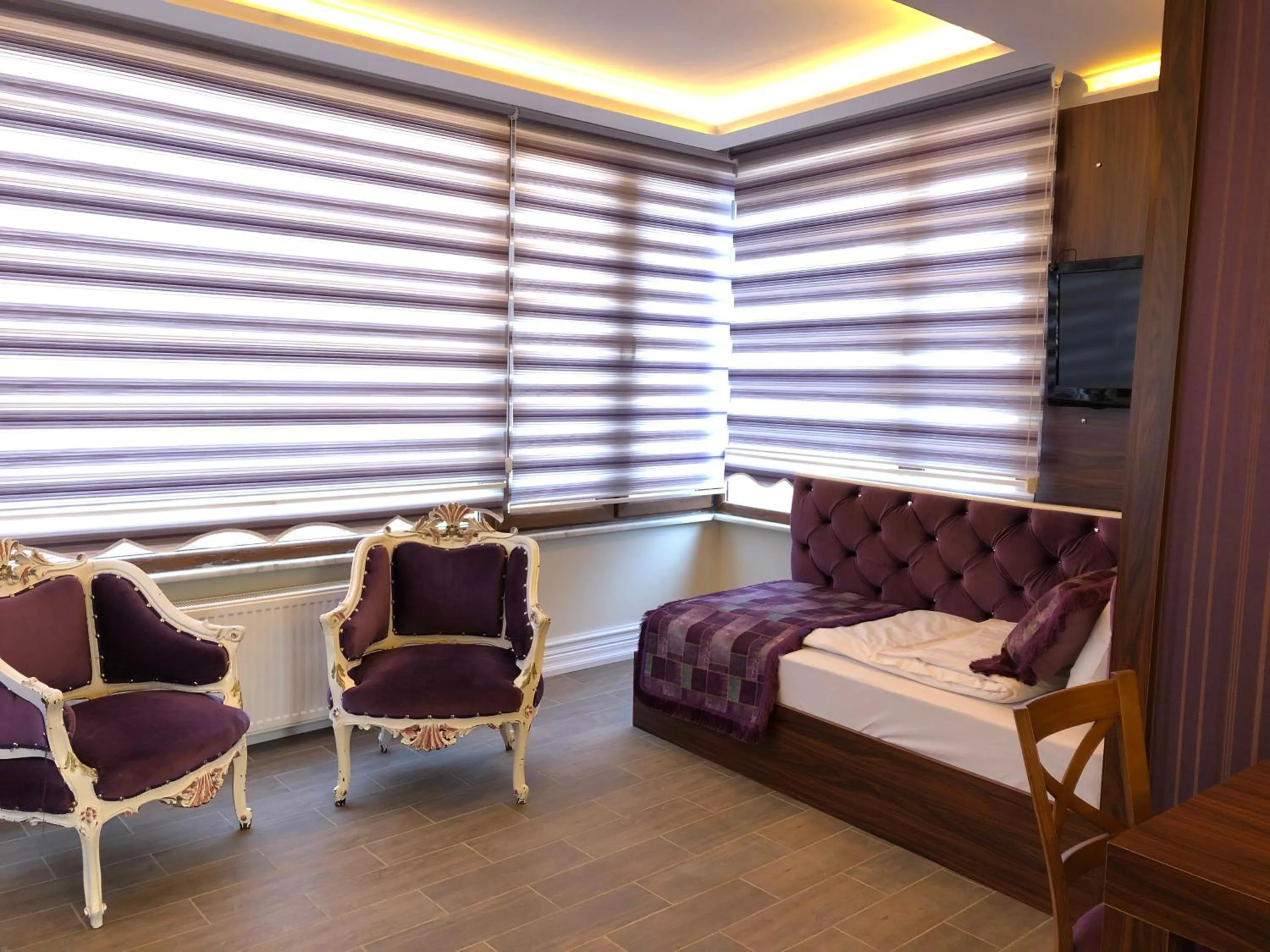 Living room, Bed in Rose Mansion by Otantik Suites