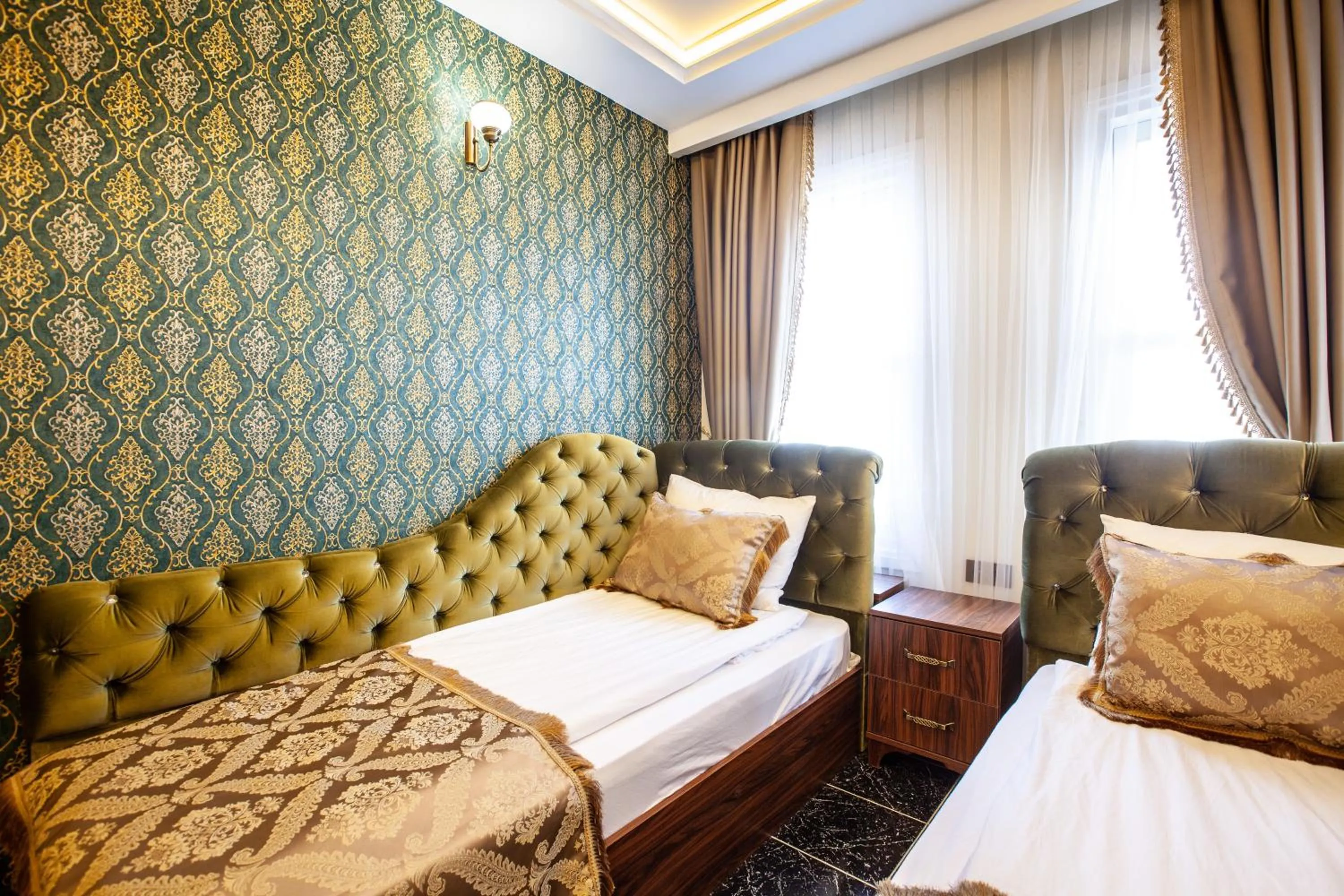 Living room, Bed in Rose Mansion by Otantik Suites