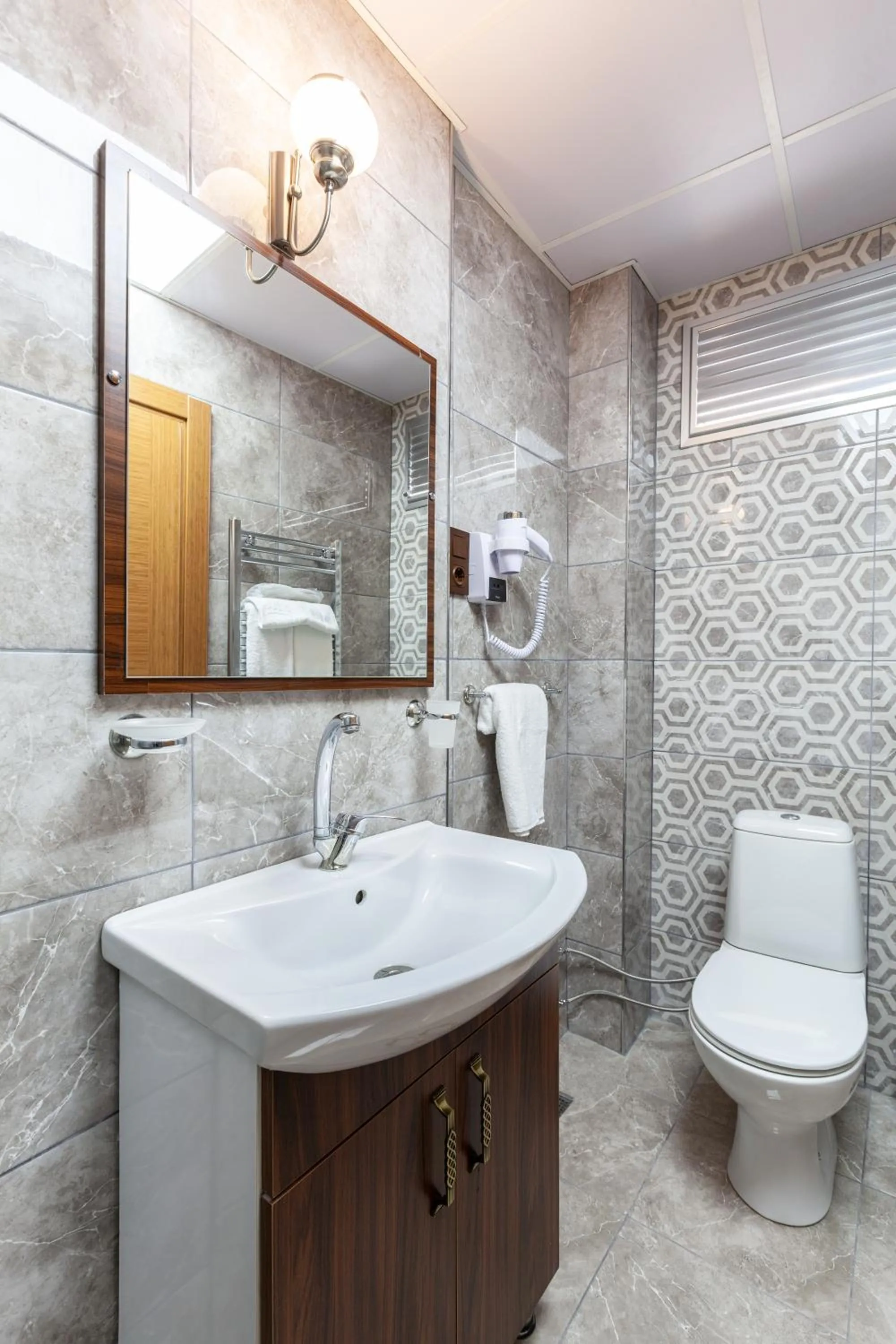 Bathroom in Rose Mansion by Otantik Suites