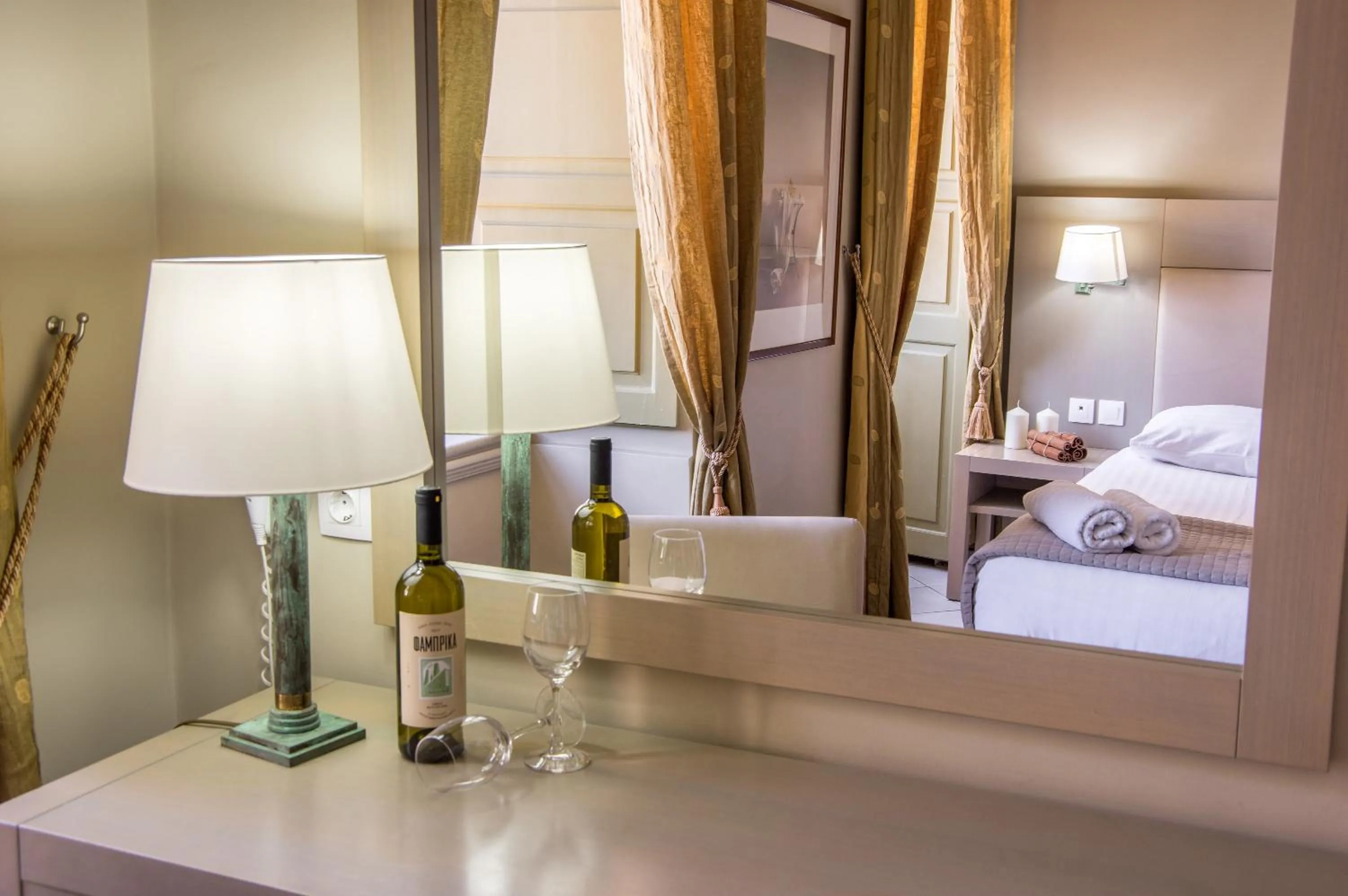 Seating area, Bed in Diogenis Hotel