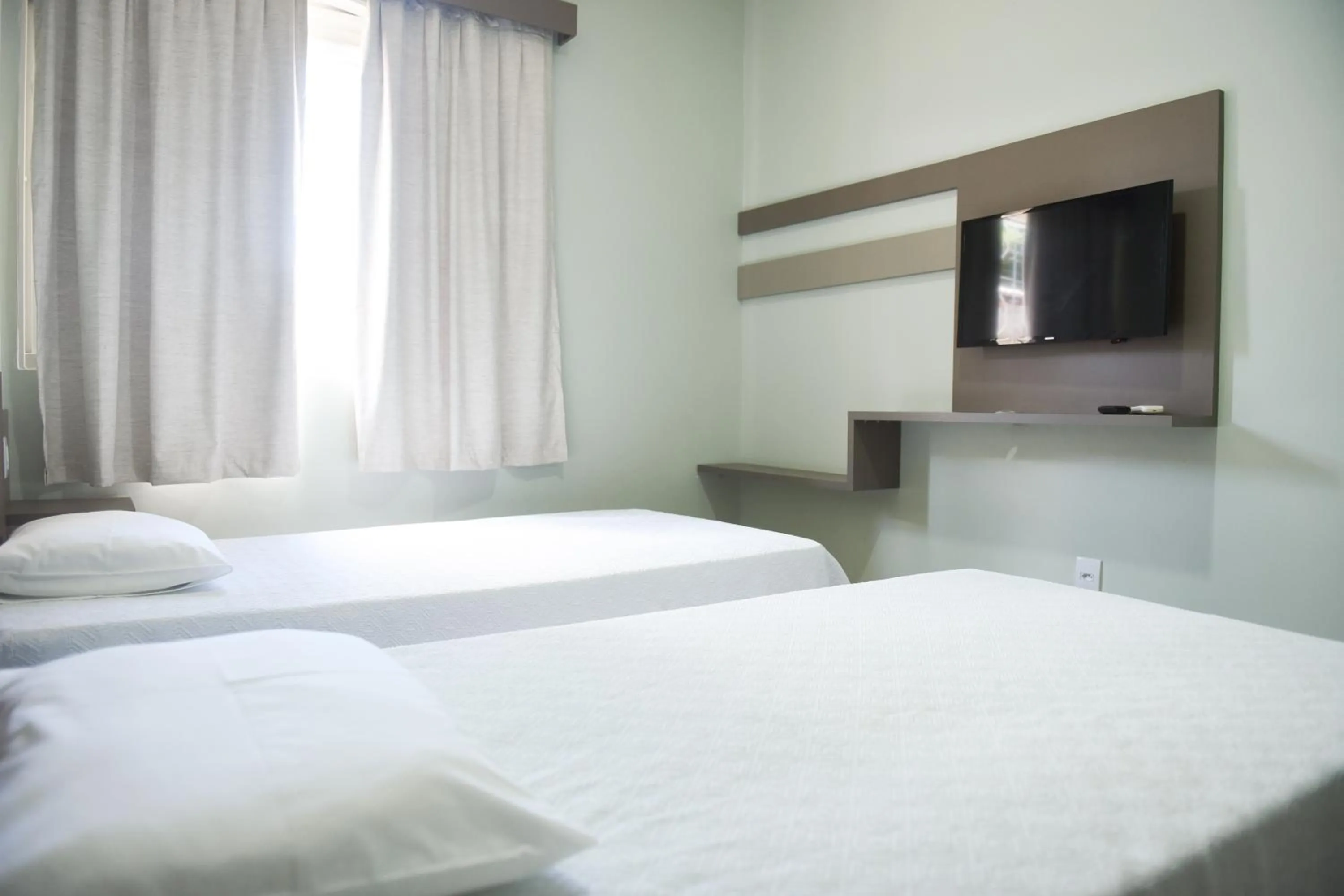 Bed in Uiramutam Palace Hotel