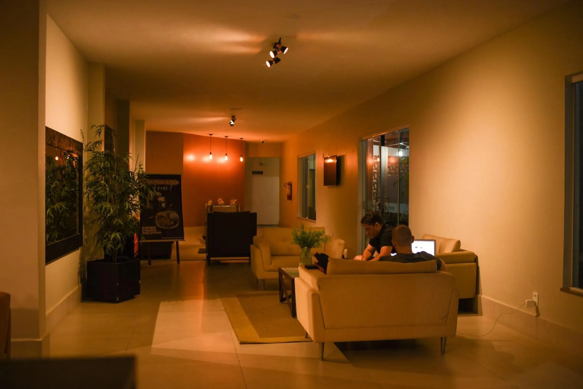 Communal lounge/ TV room in Uiramutam Palace Hotel