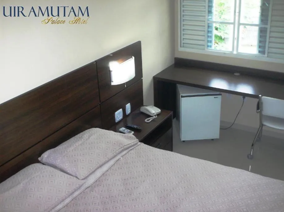 Bed in Uiramutam Palace Hotel