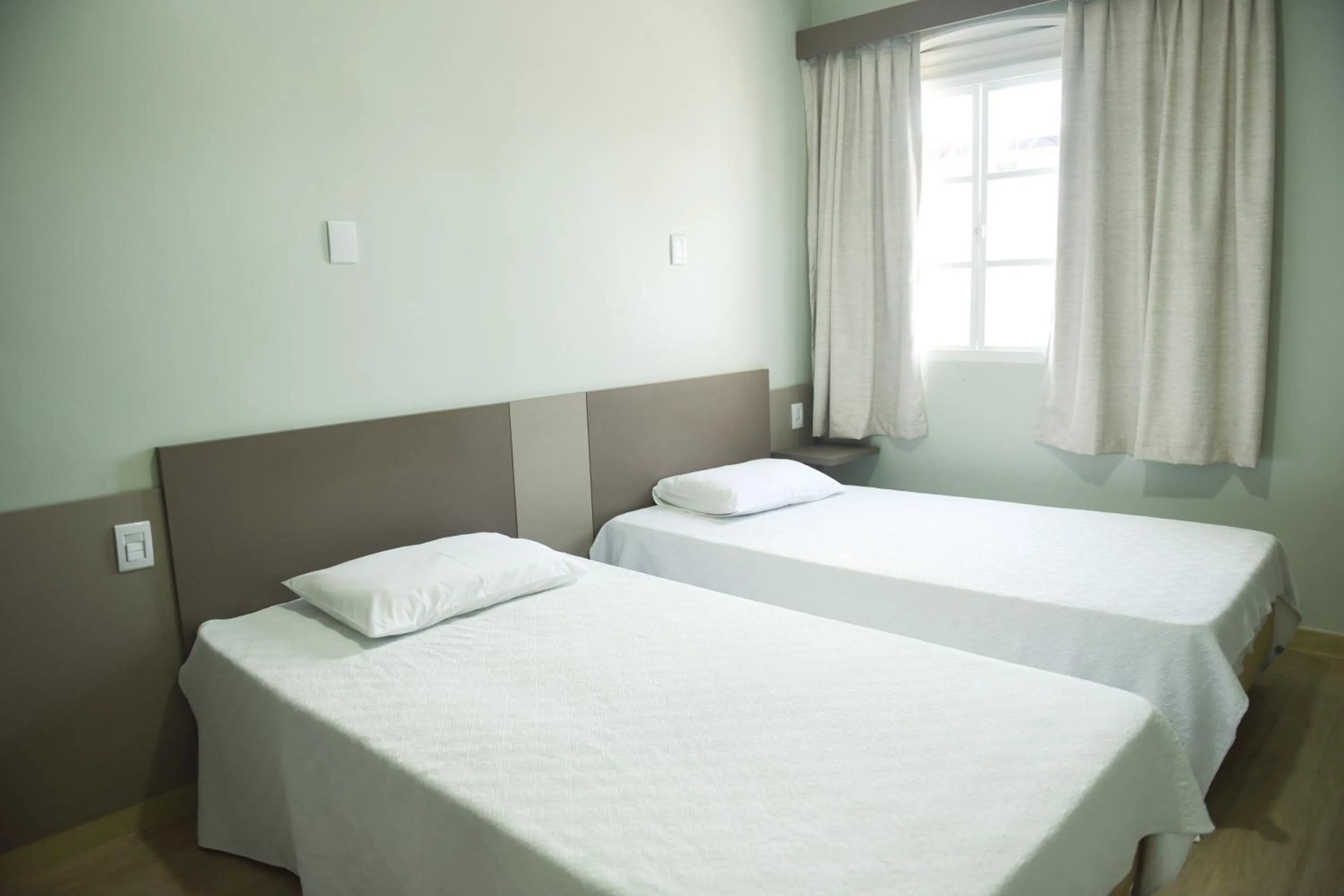 Bed in Uiramutam Palace Hotel