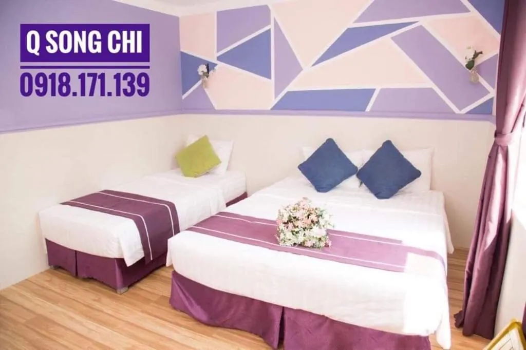 Bed in Q Songchi Hotel