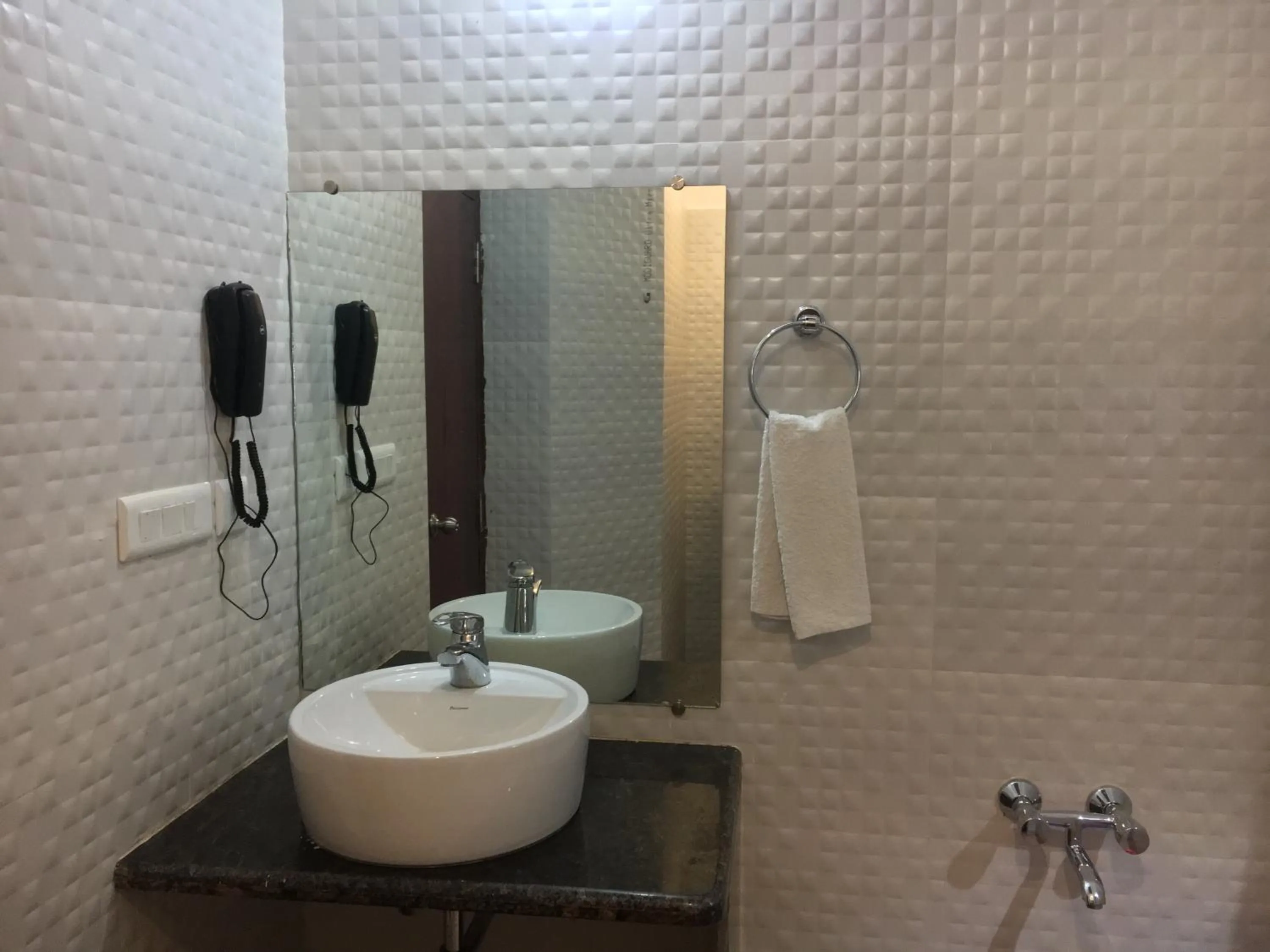 Bathroom in Indo Hokke Hotel