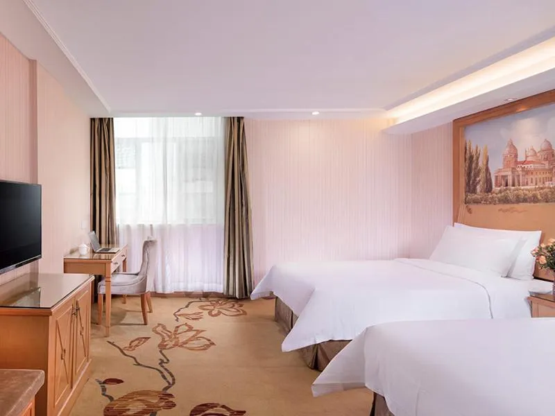 Bed in Vienna Hotel Qingyuan Yingde Guangming Road